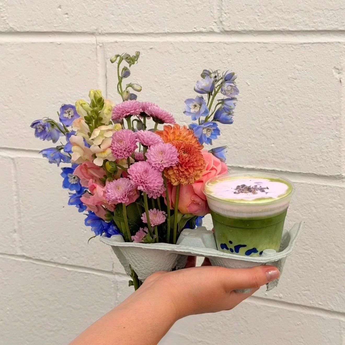 Fresh bouquet and iced matcha from Aira Matcha Studio during Rudy's Summer Series.