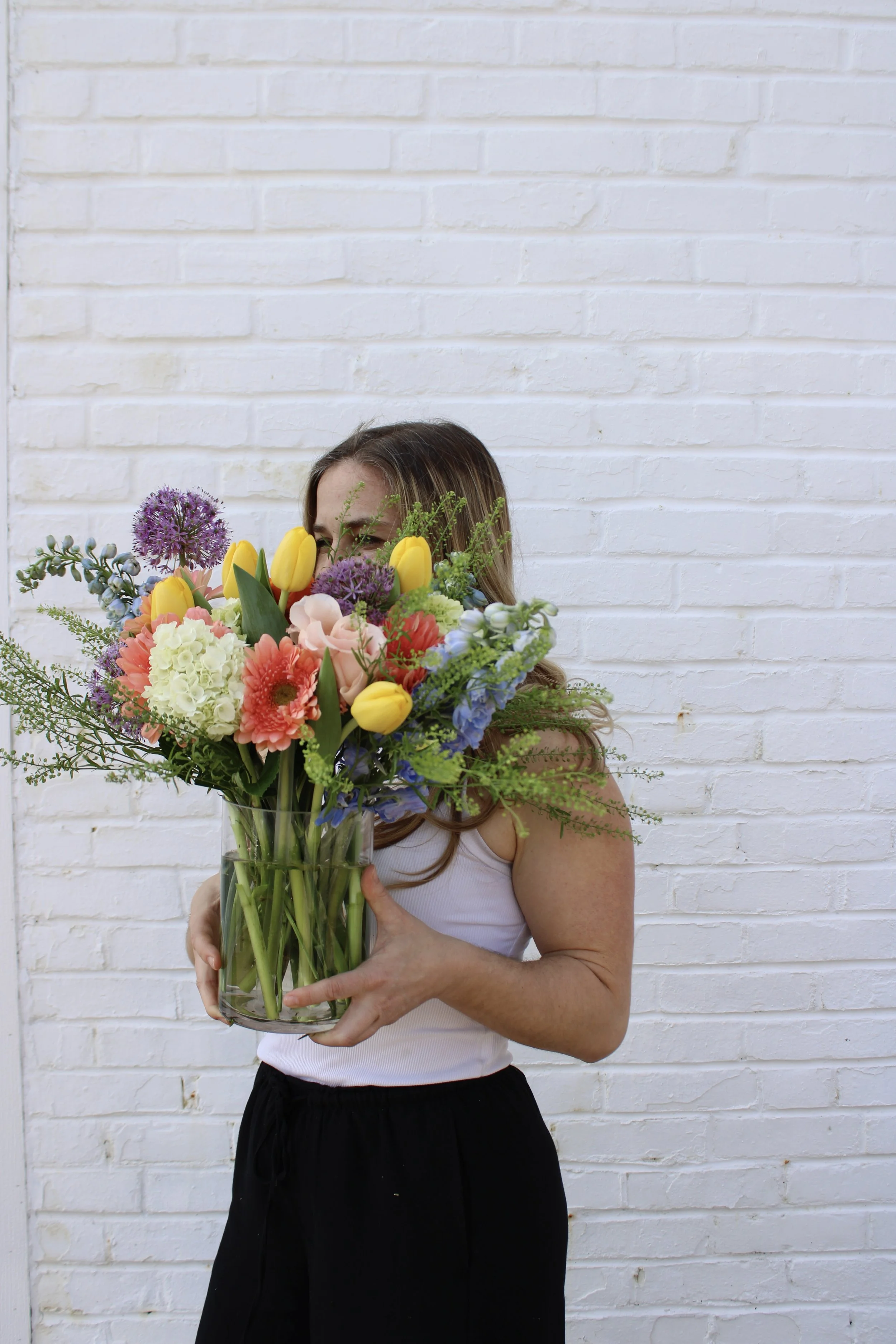 colorful large bouquet wrapped in brown paper, st. louis florist, same day delivery, stl weddings, easter flowers