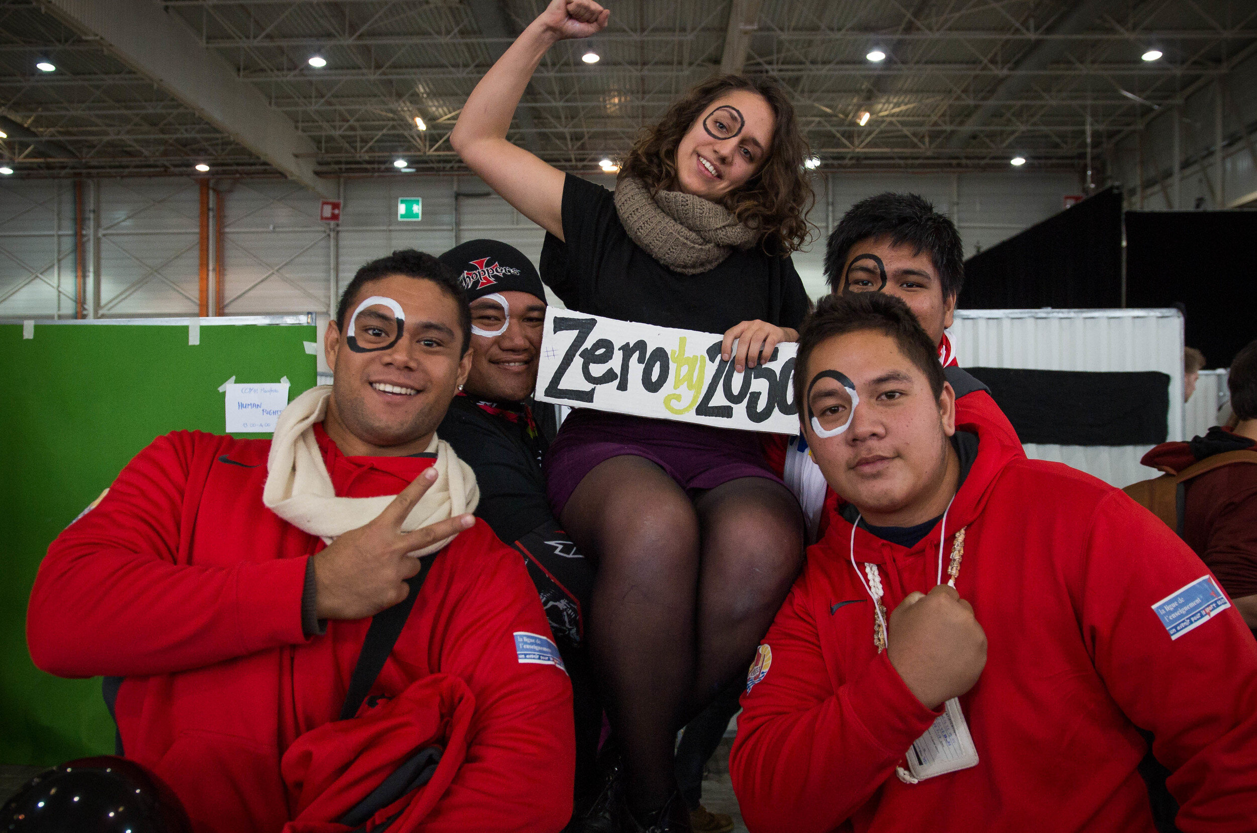 US organizer and SustainUS Delegation leader Dyanna Jaye championing Zero by 2050, being supported by delegates from French Polynesia