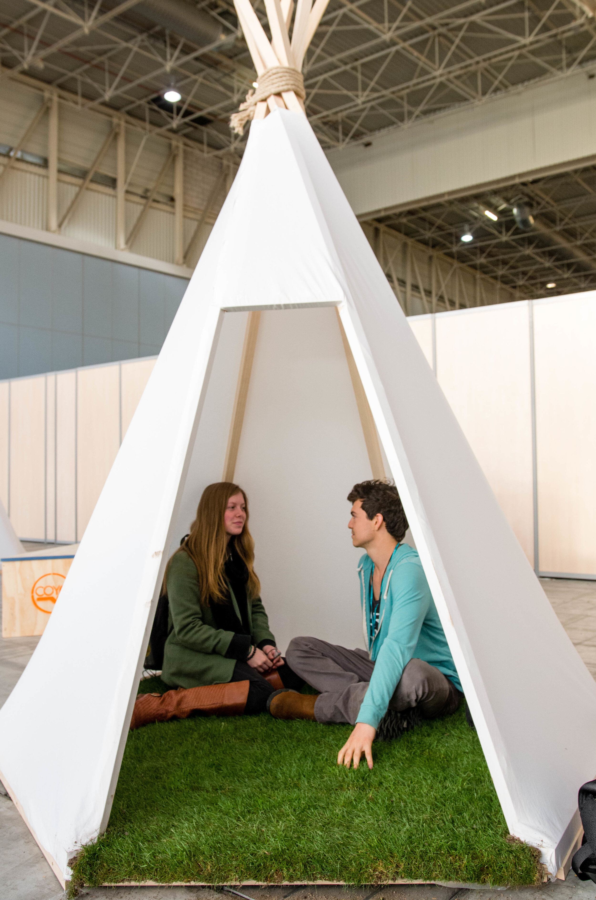 Real grass inside tipi inspired meeting spaces at COY 11