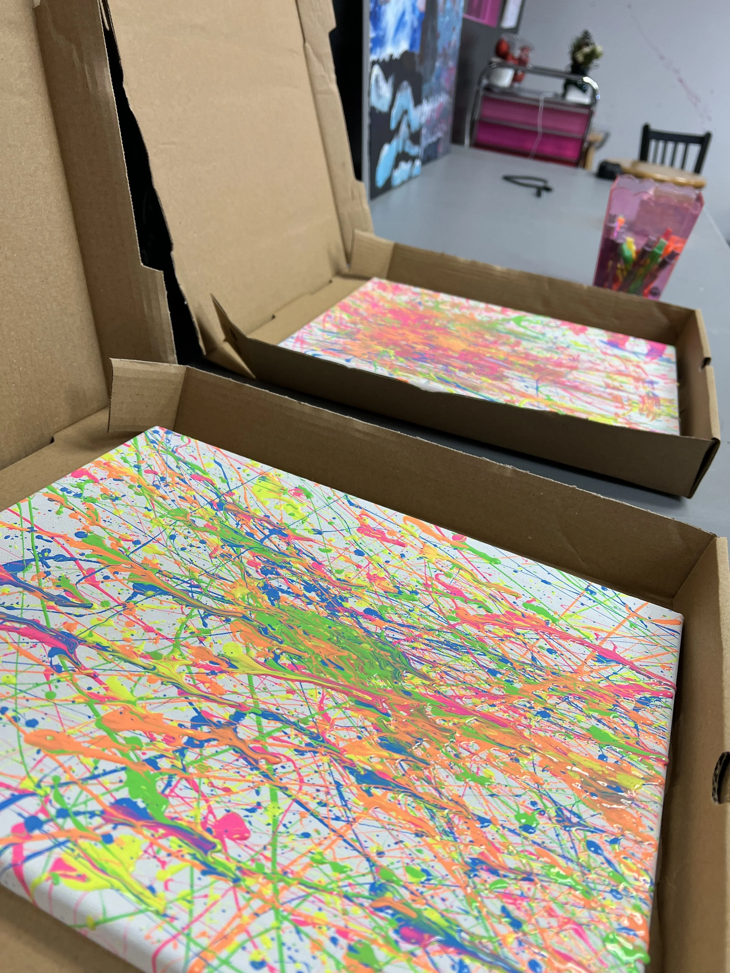 Splatter canvases in boxes pic1.JPG