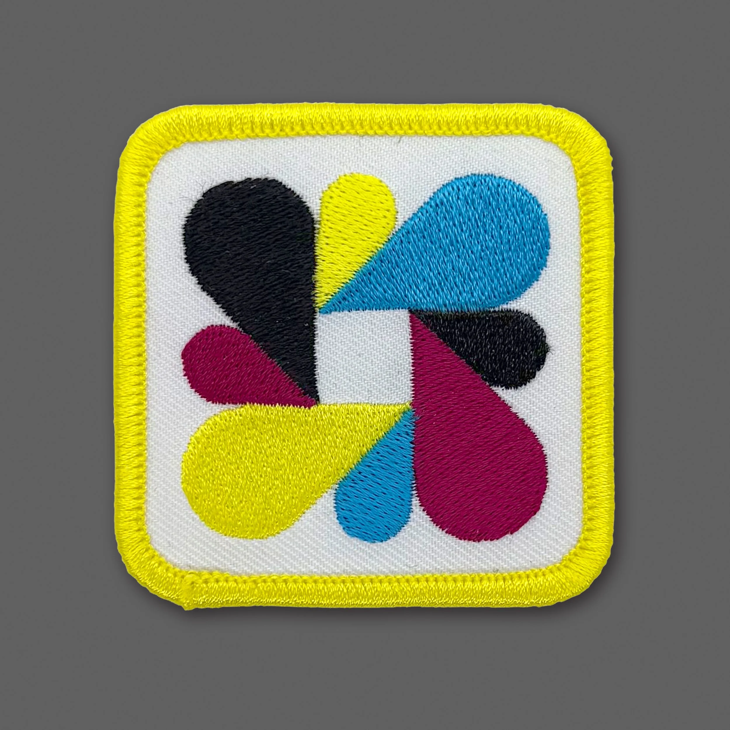 DDC-367 “CMYK Droplets - White” Souvenir Patch