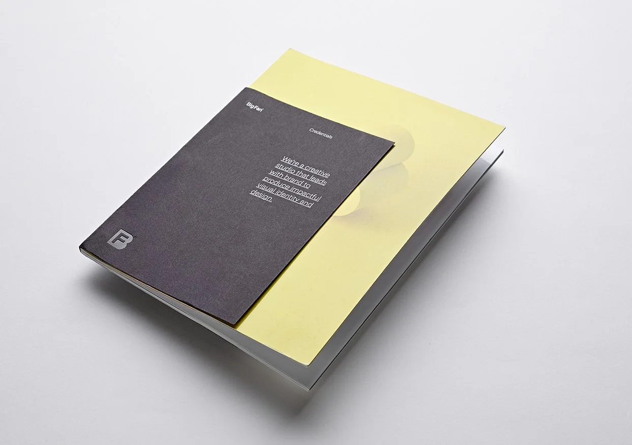 Big Fan. Digital print. Featuring foil and deboss to short cover. Short insert pages. Digital white ink. High Gloss Lamination. Swatch bound.
