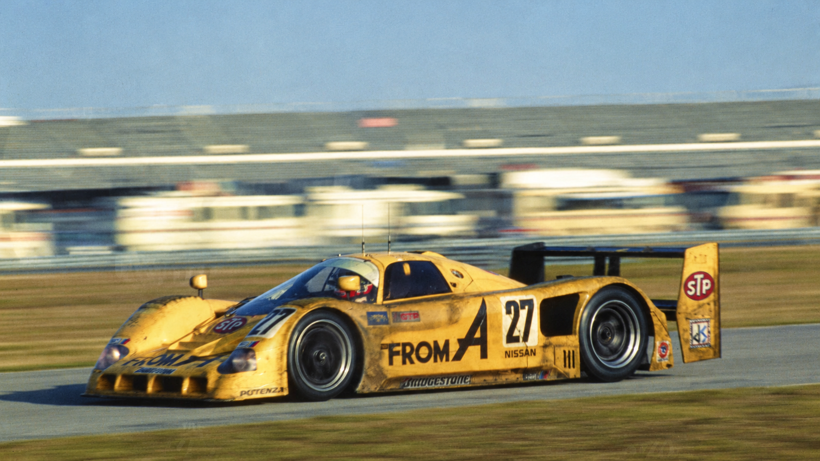 Vintage Yellow Nissan Group C Racer.png