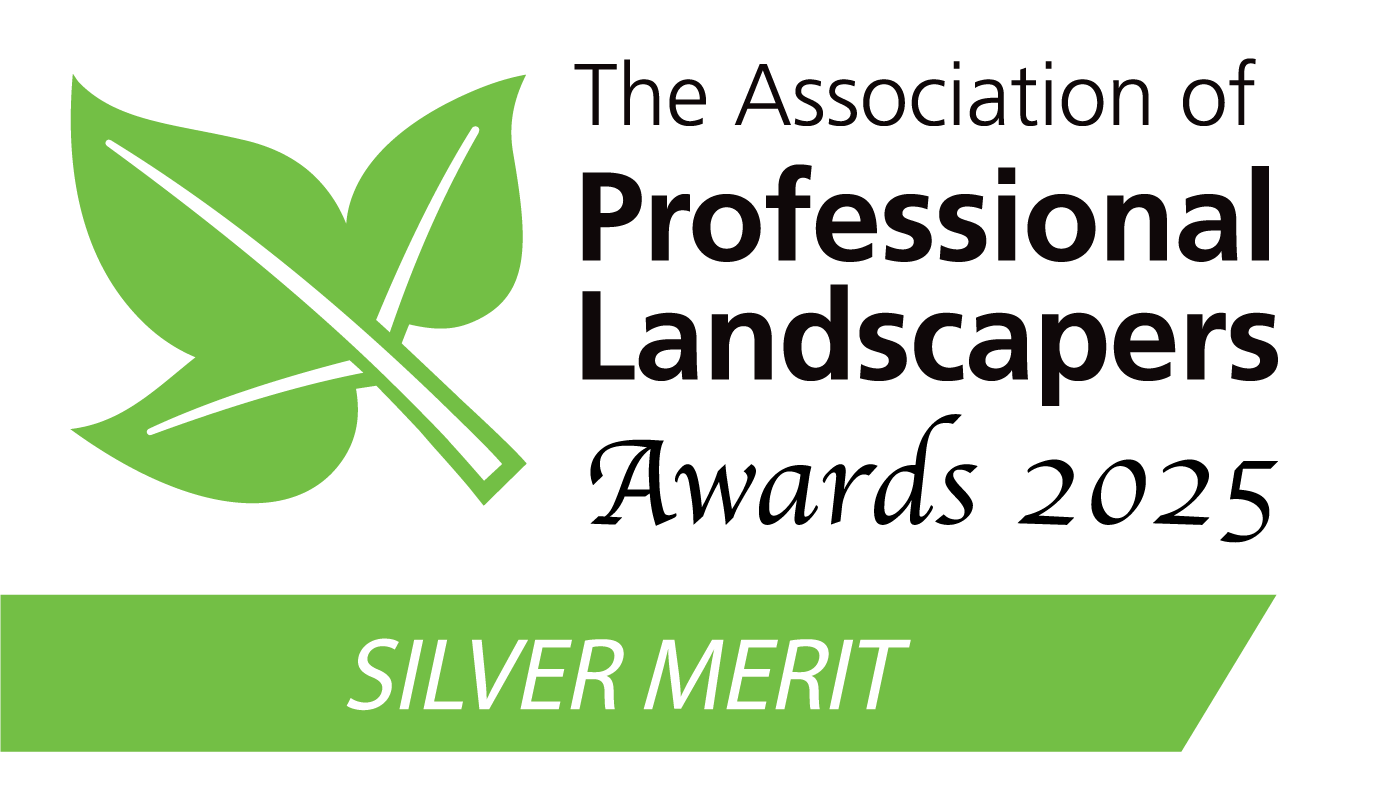 Logo of The Association of Professional Landscapers with a green leaf icon, black and green text, and a green banner stating 'Silver Merit'.