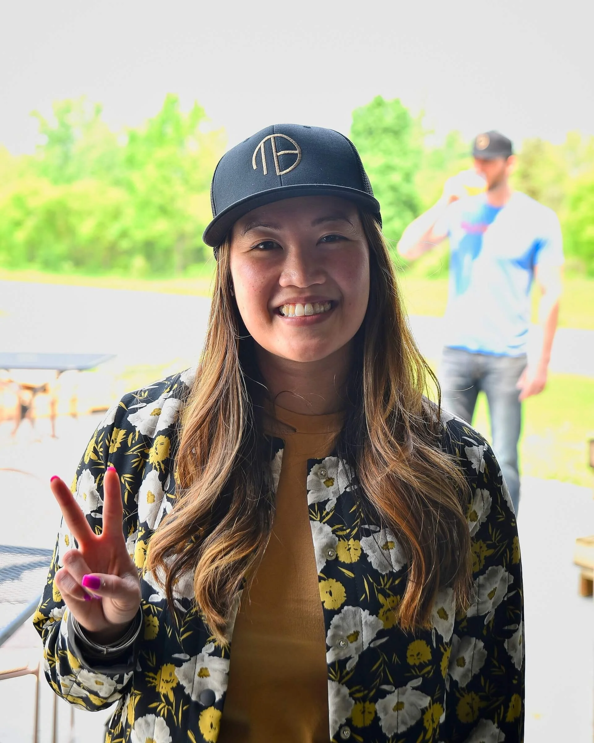 Mortalis_Woman_Peace_Sign.jpg