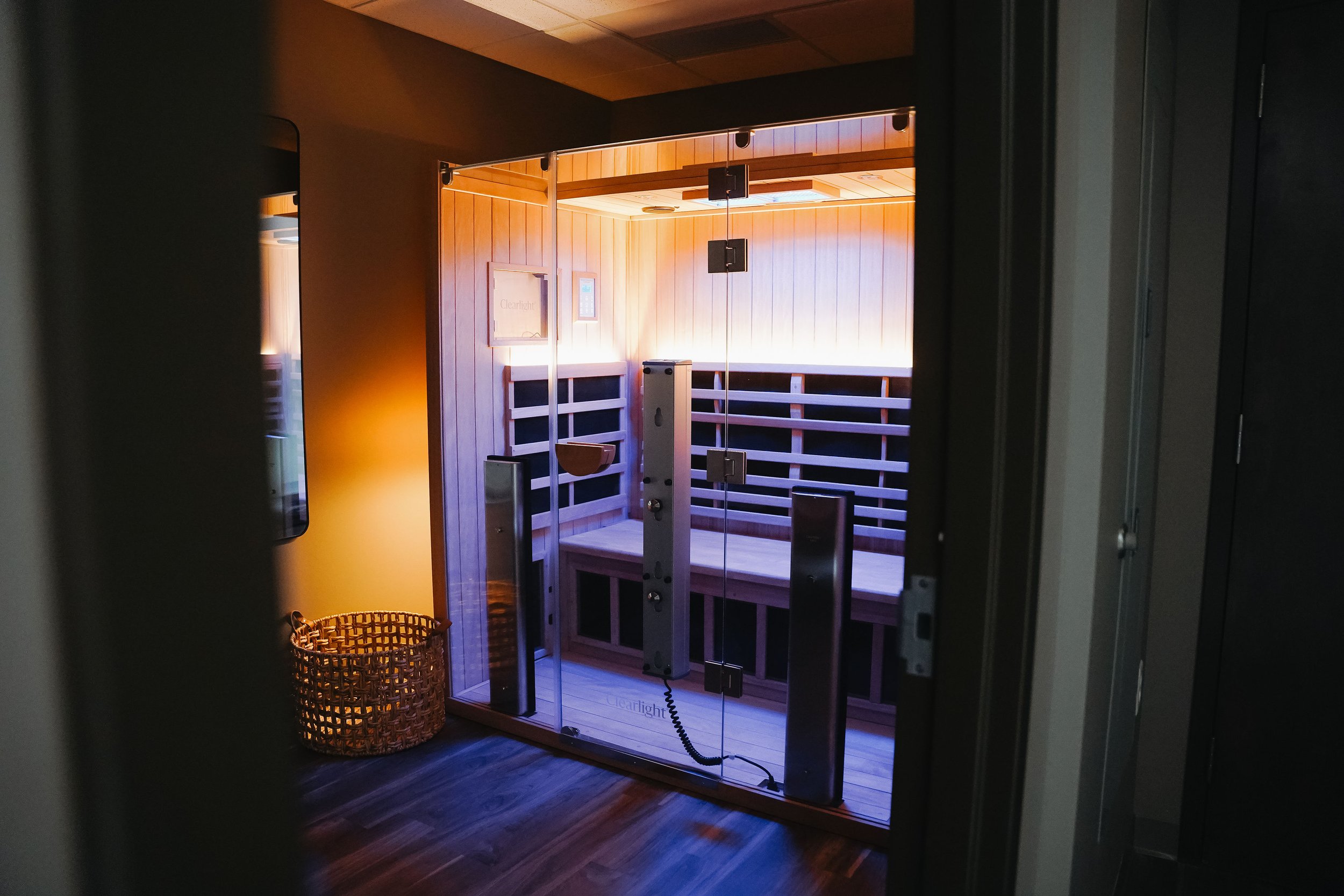 Empty sauna with purple lighting at Cedar House.jpg