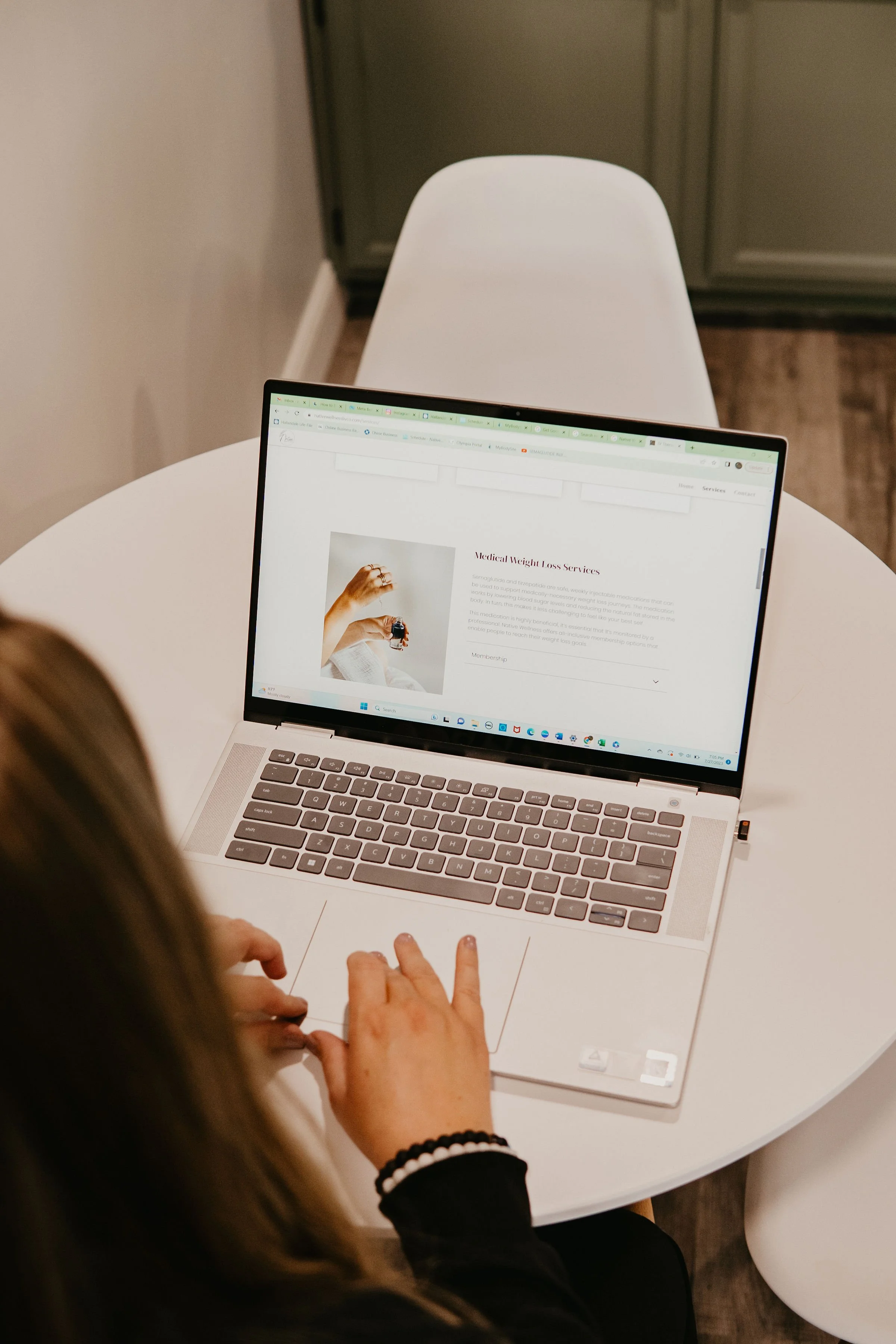 woman on laptop native wellness medical weight services.jpg