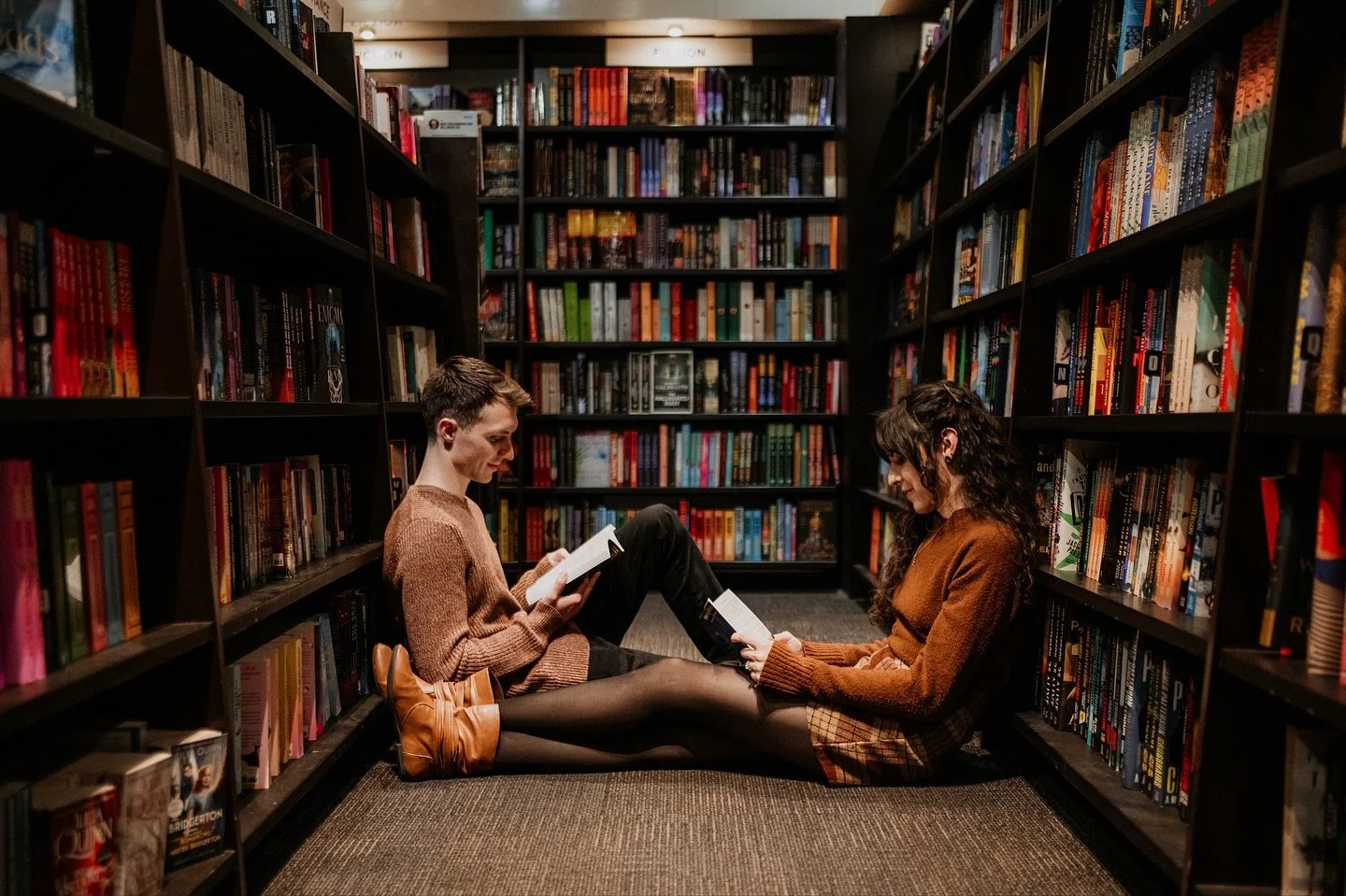 As a book lover, I can tell you I was absolutely STOKED when these two told me they wanted to do part of their engagement session in a bookstore! This was their first time getting photos done together and they crushed it! So loving, cuddly, smiley, a
