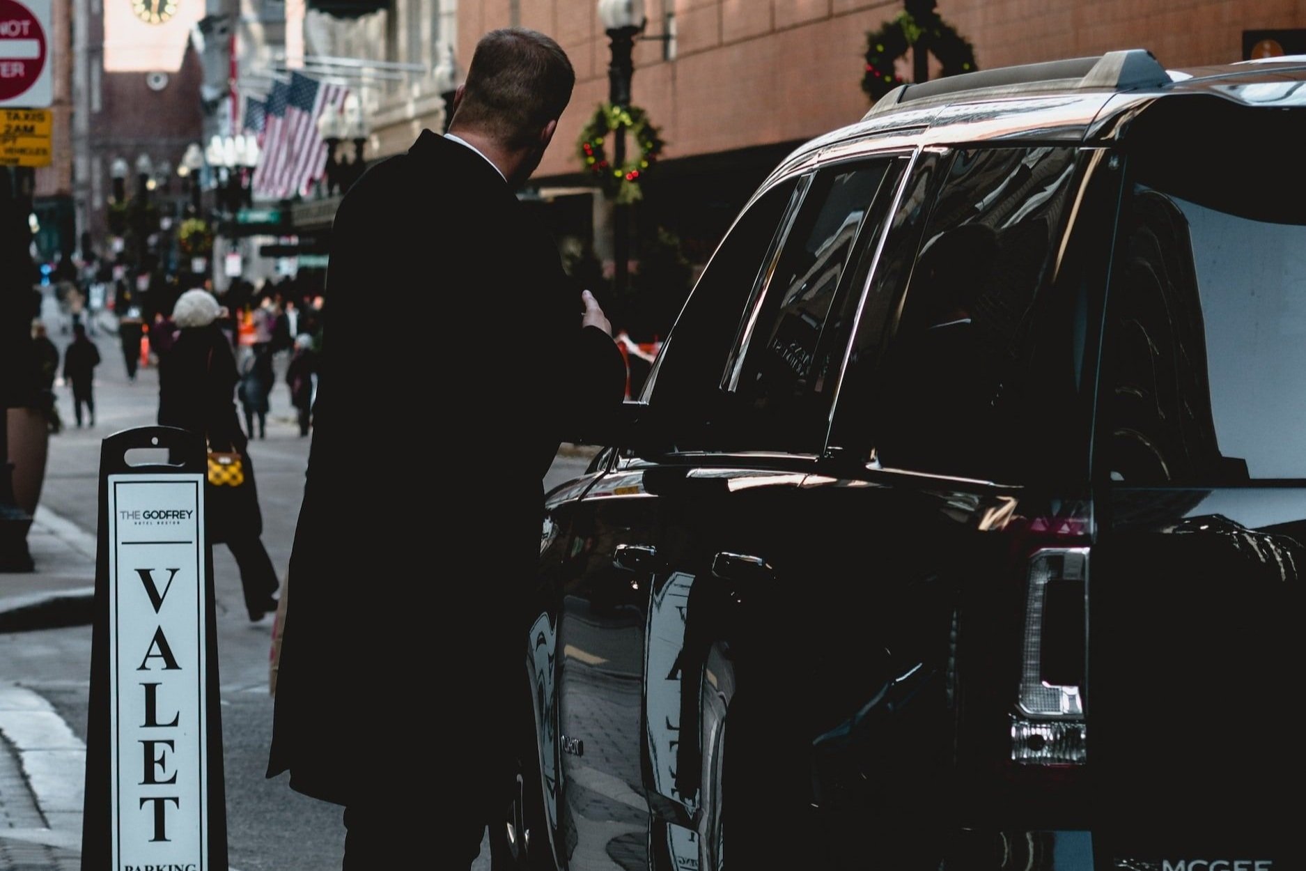 uniformed valet parking attendant