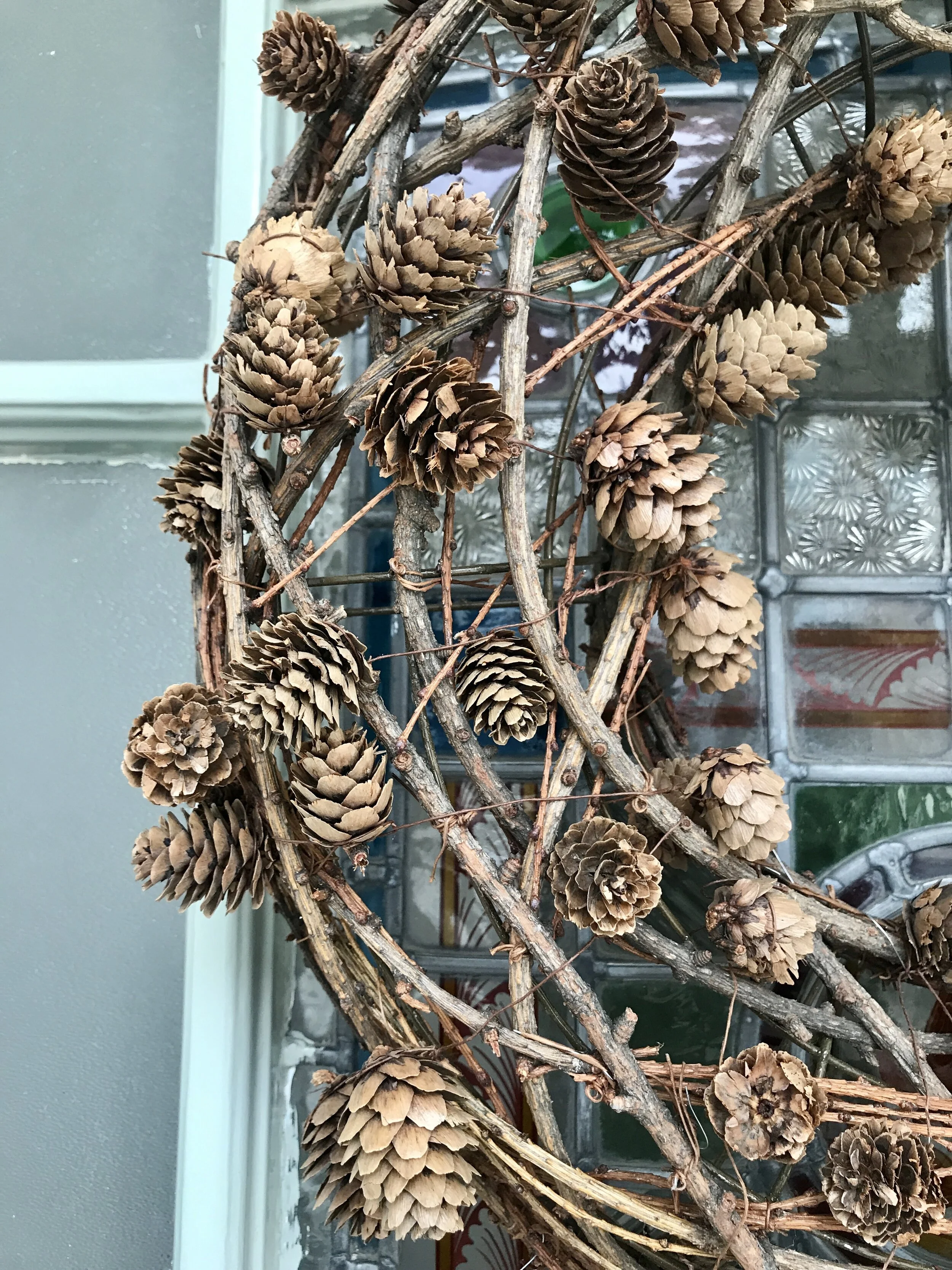large twig and pine cone wreath