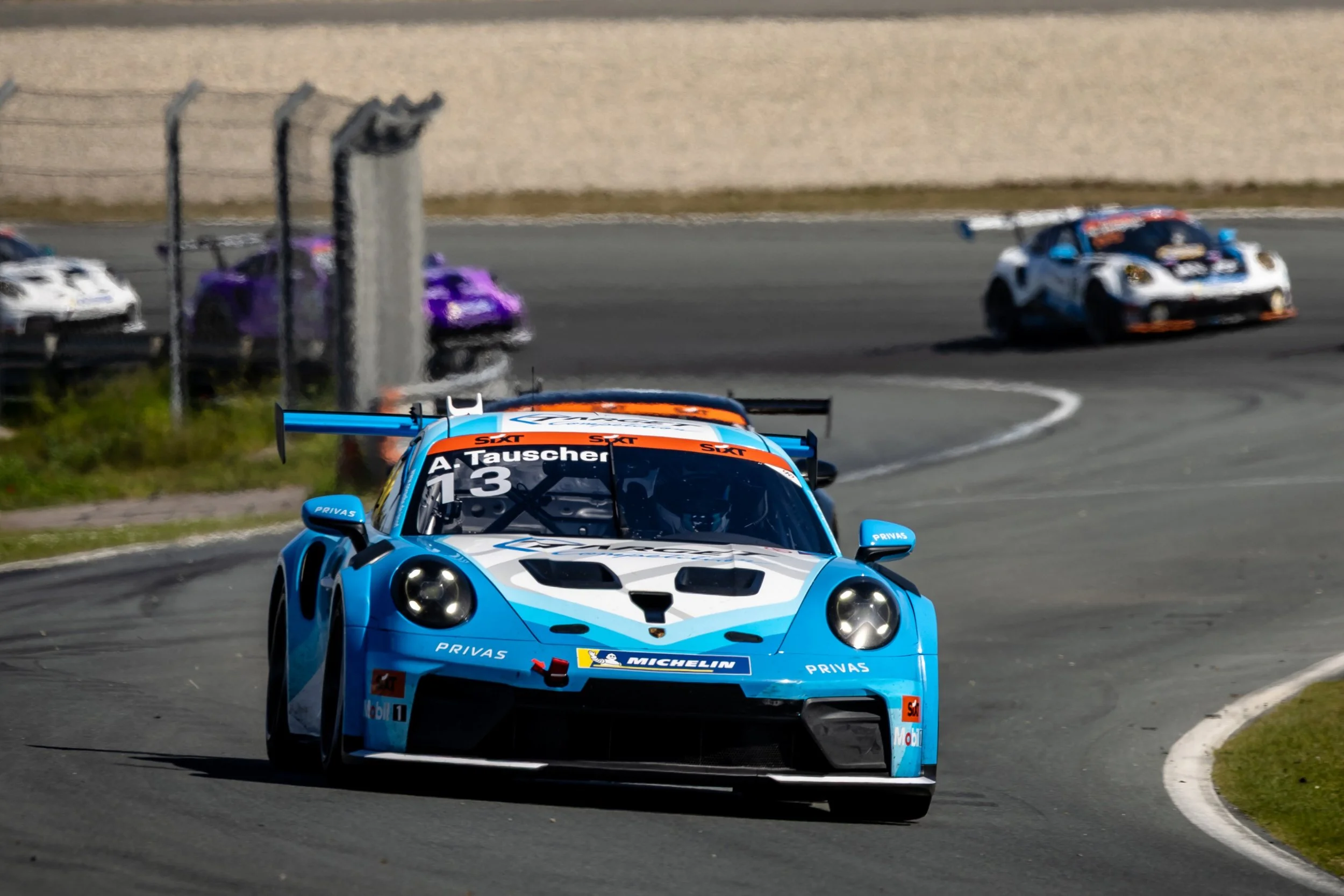Bavarian Alexander Tauscher extends championship lead with emotional victory