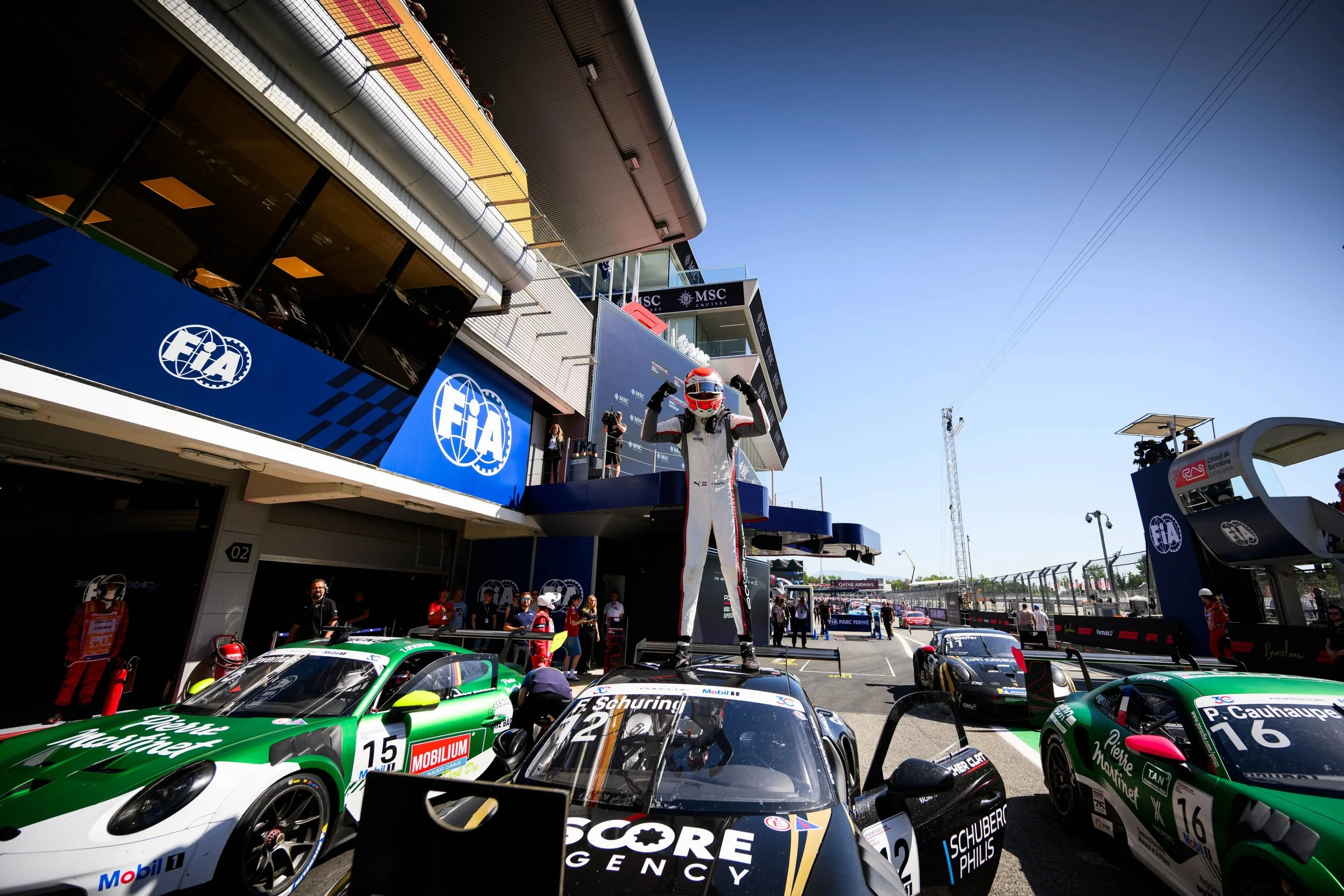 Porsche Junior Flynt Schuring celebrates his first Supercup victory