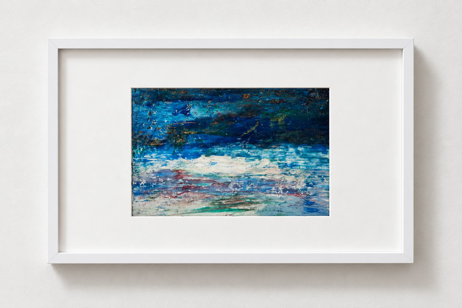 Abstract watercolor painting with shades of blue, white, pink, and green, framed with a white border and displayed on a white wall.