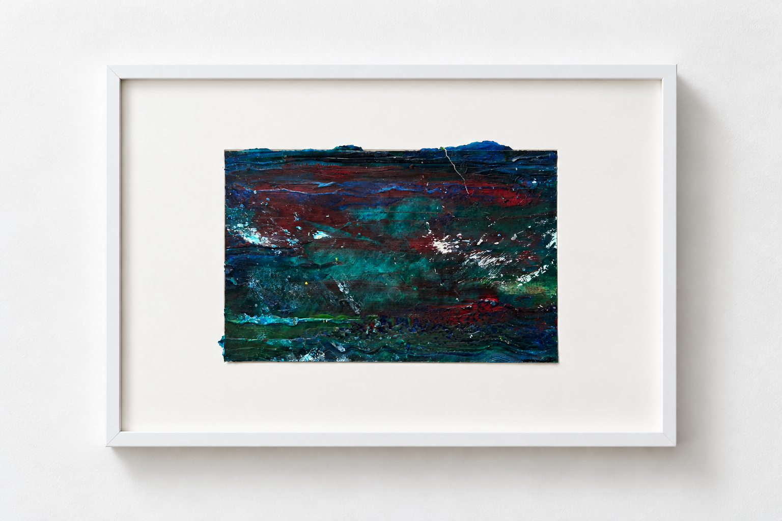 Abstract painting with dark blues, greens, reds, and white paint splatters in a white frame.