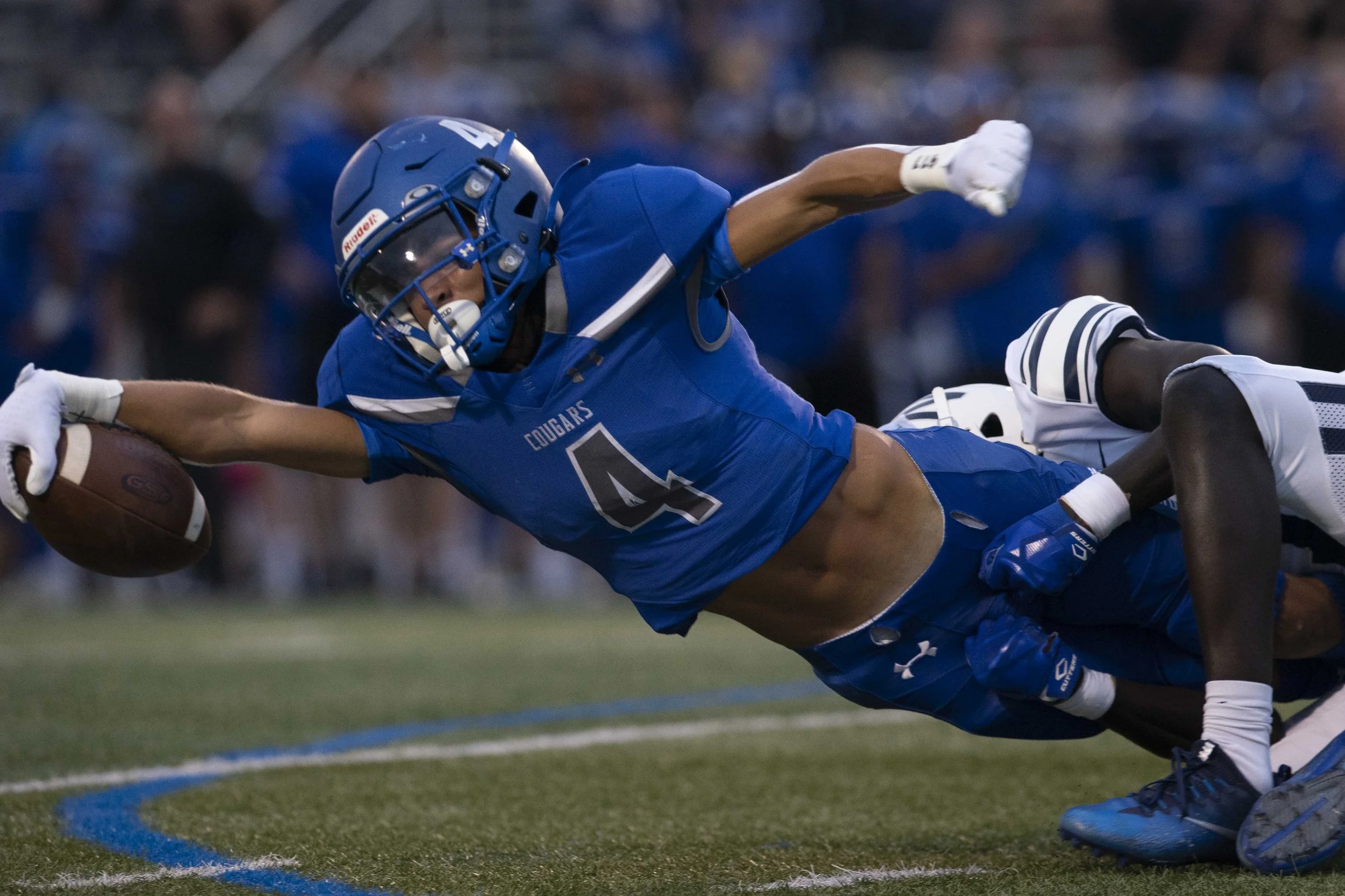  Barron Collier's Daniel Isakov (6) stretches for yardage during the first half of a Florida 6A District 14 high school football game between Naples and Barron Collier, Friday, Oct. 1, 2021, at Barron Collier High School in Naples, Fla.  Naples led B
