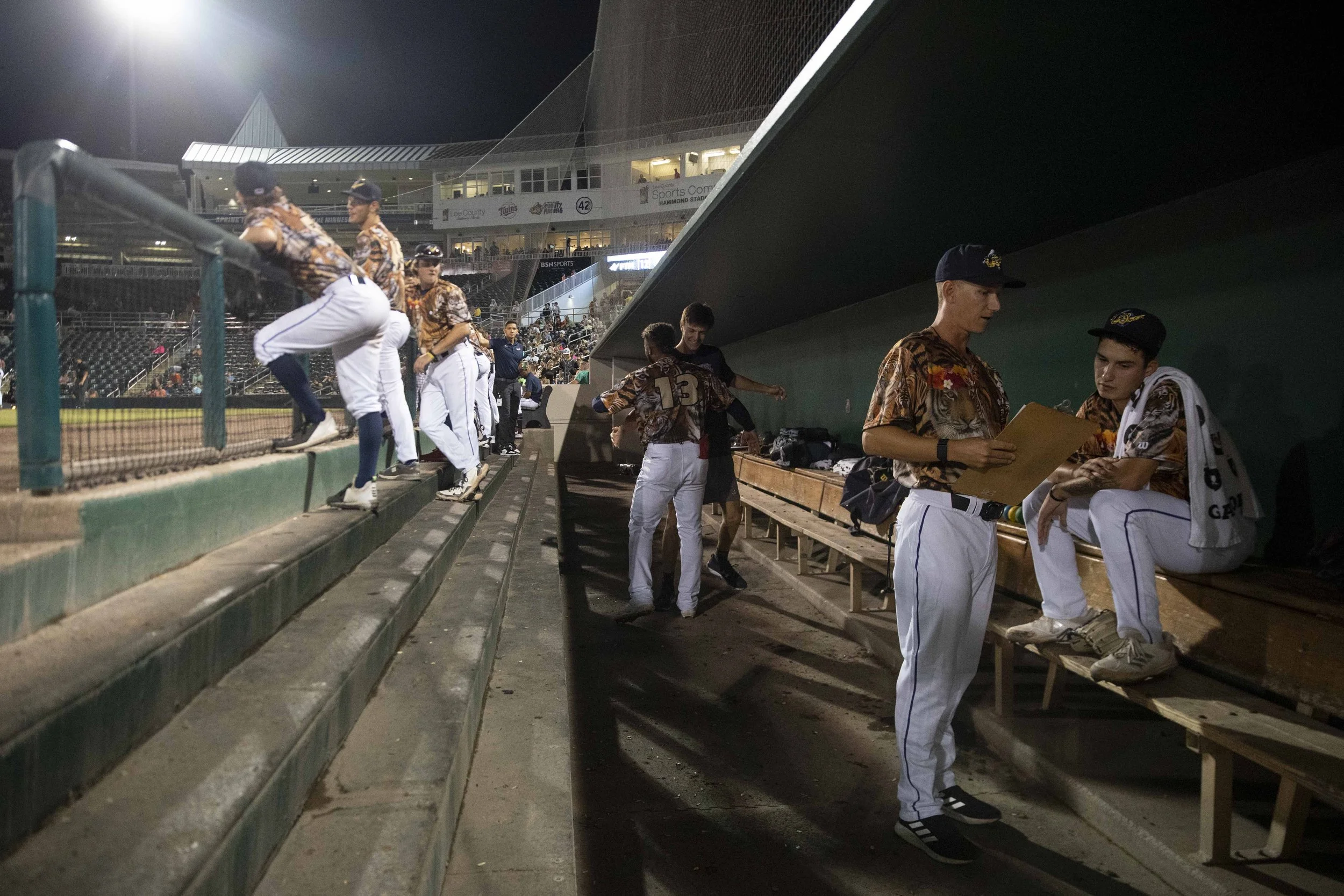  Fort Myers Mighty Mussels' pitching coach Jared Gaynor (18) coaches Fort Myers Mighty Mussels' Mike Paredes (38) during the bottom of the eighth inning of the Single-A MiLB game between the Jupiter Hammerheads and Fort Myers Mighty Mussels, Friday, 