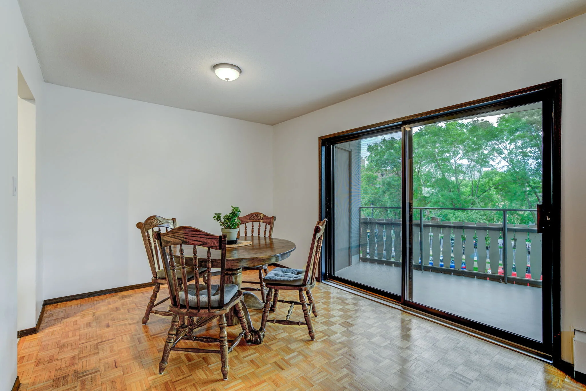 400+Groveland+Ave+%23213+Minneapolis-4-web-Spacious+dining+leading+out+to+balcony.jpg