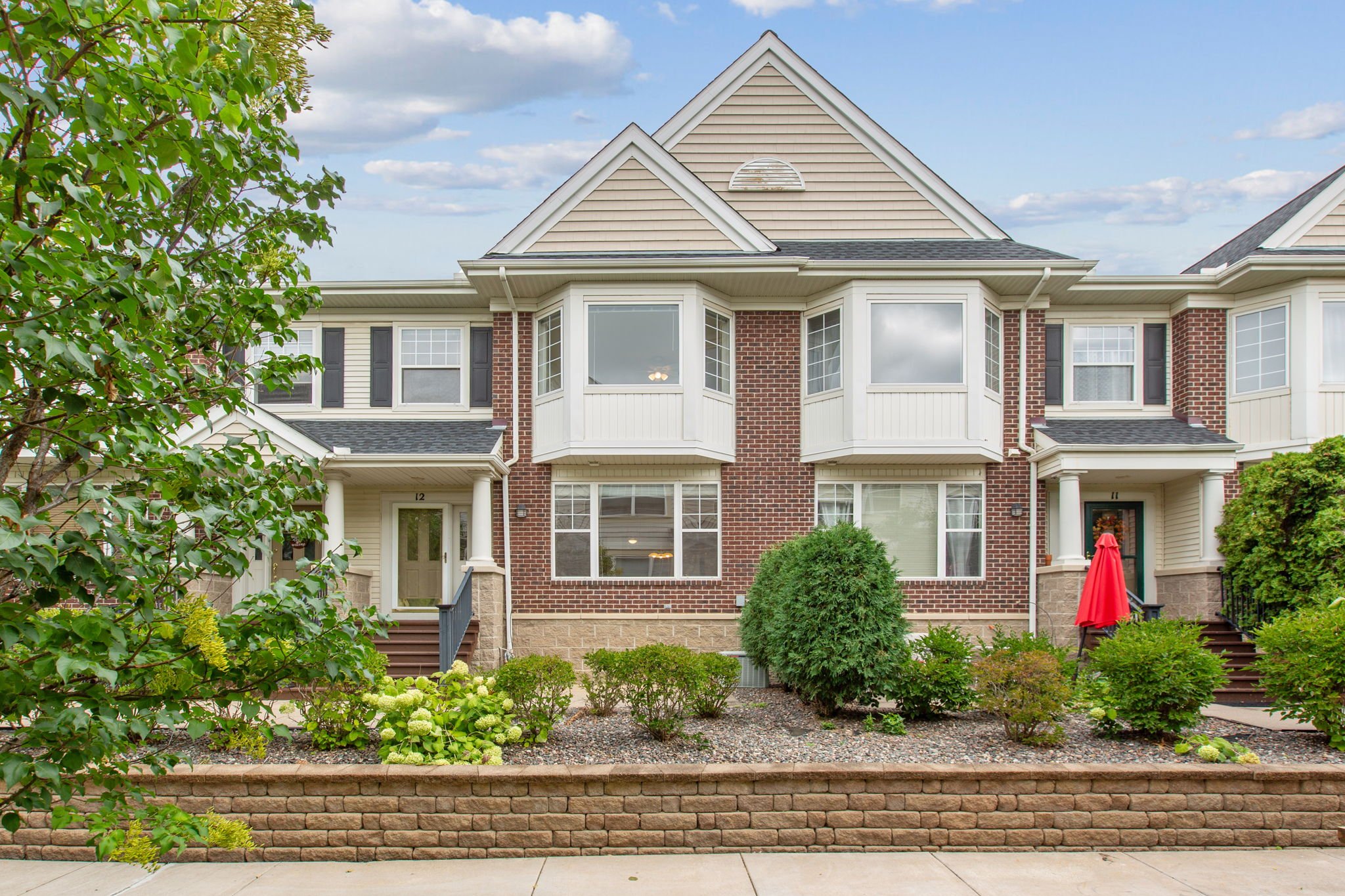 Immaculate Plymouth townhome located in The Reserve