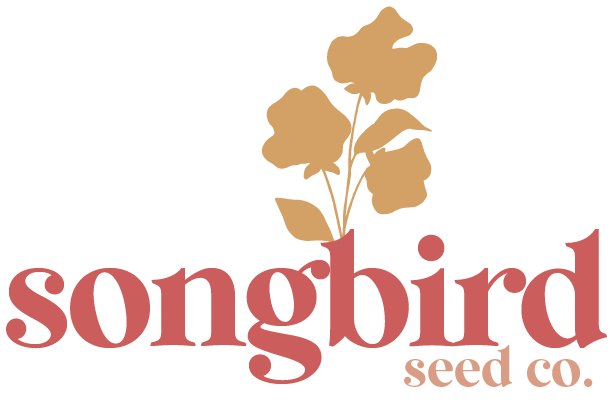 Logo of Songbird Seed Co. with a stylized tree or flower above the company name.