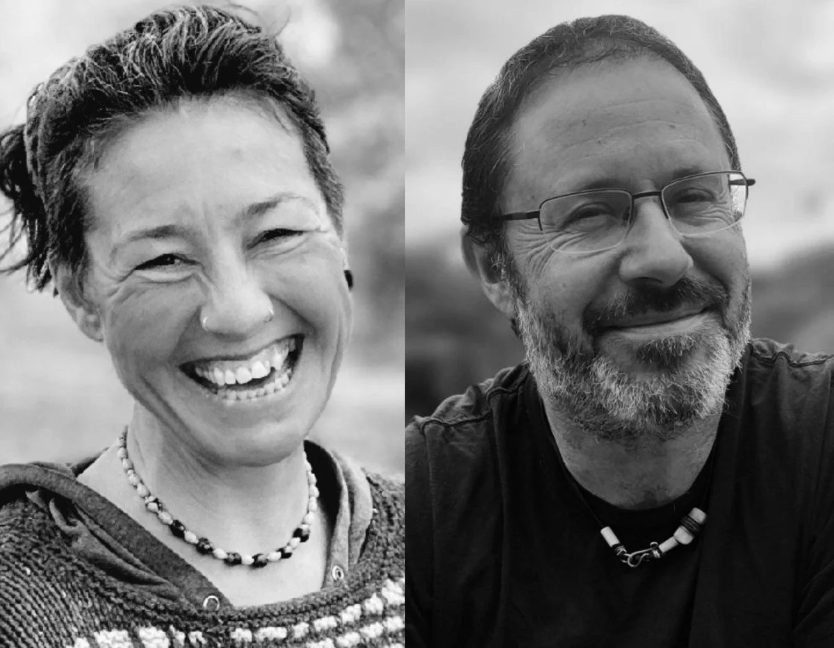 Black and white side-by-side portraits of a woman and a man smiling outdoors.