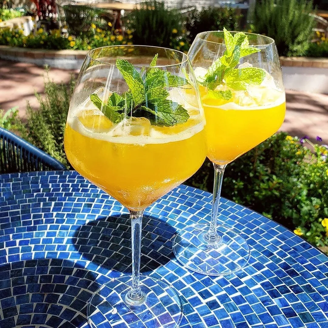 Life In Paradiso&mdash;made with gin, strega, topo chico, mint, lemon, passion fruit and 
orange flower. 
📸: @clarahleo