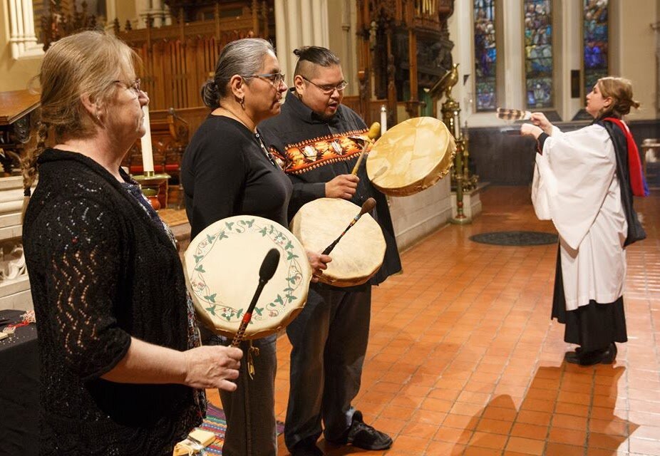 Indigenous drummers in a church