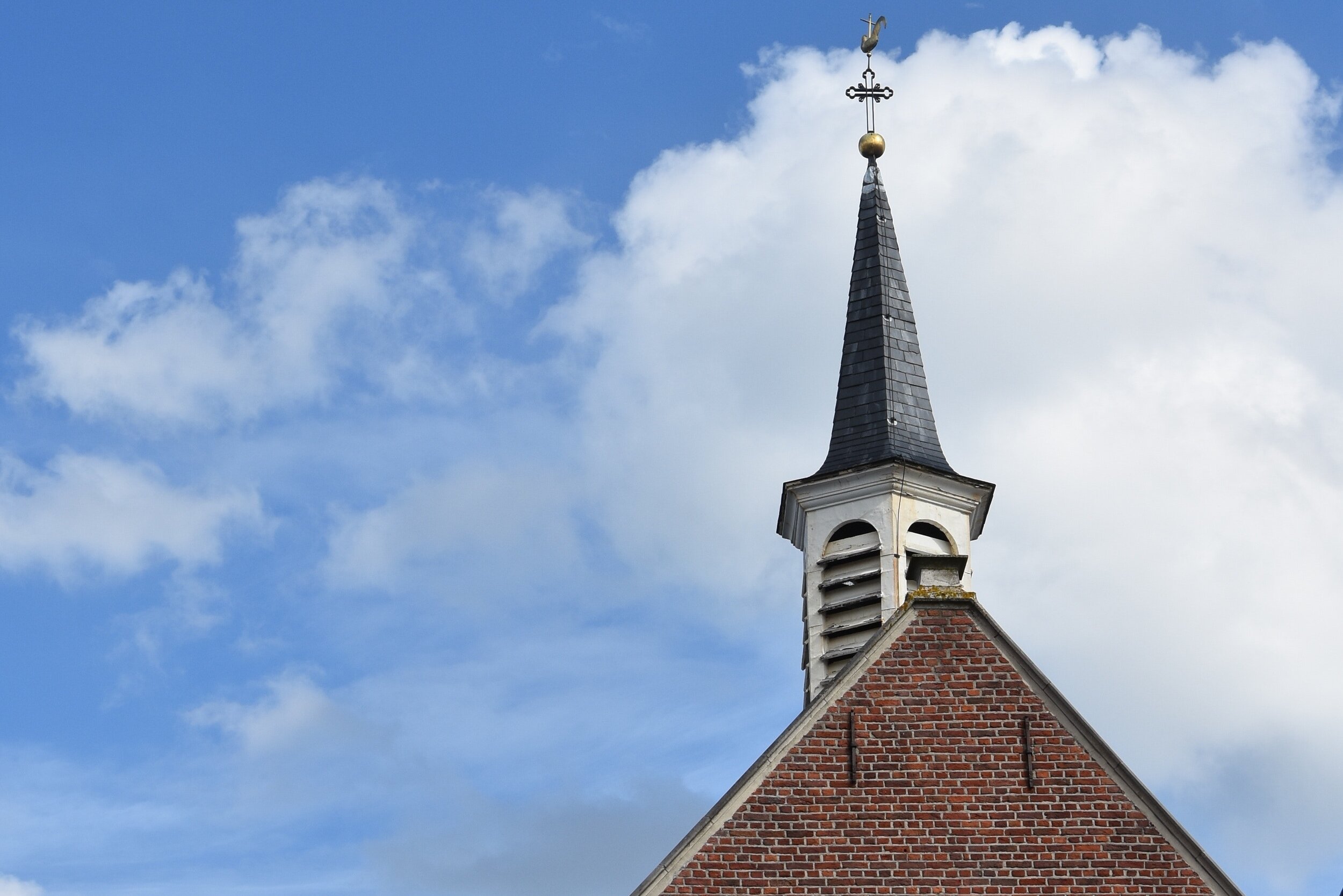 church steeple against a blue sky