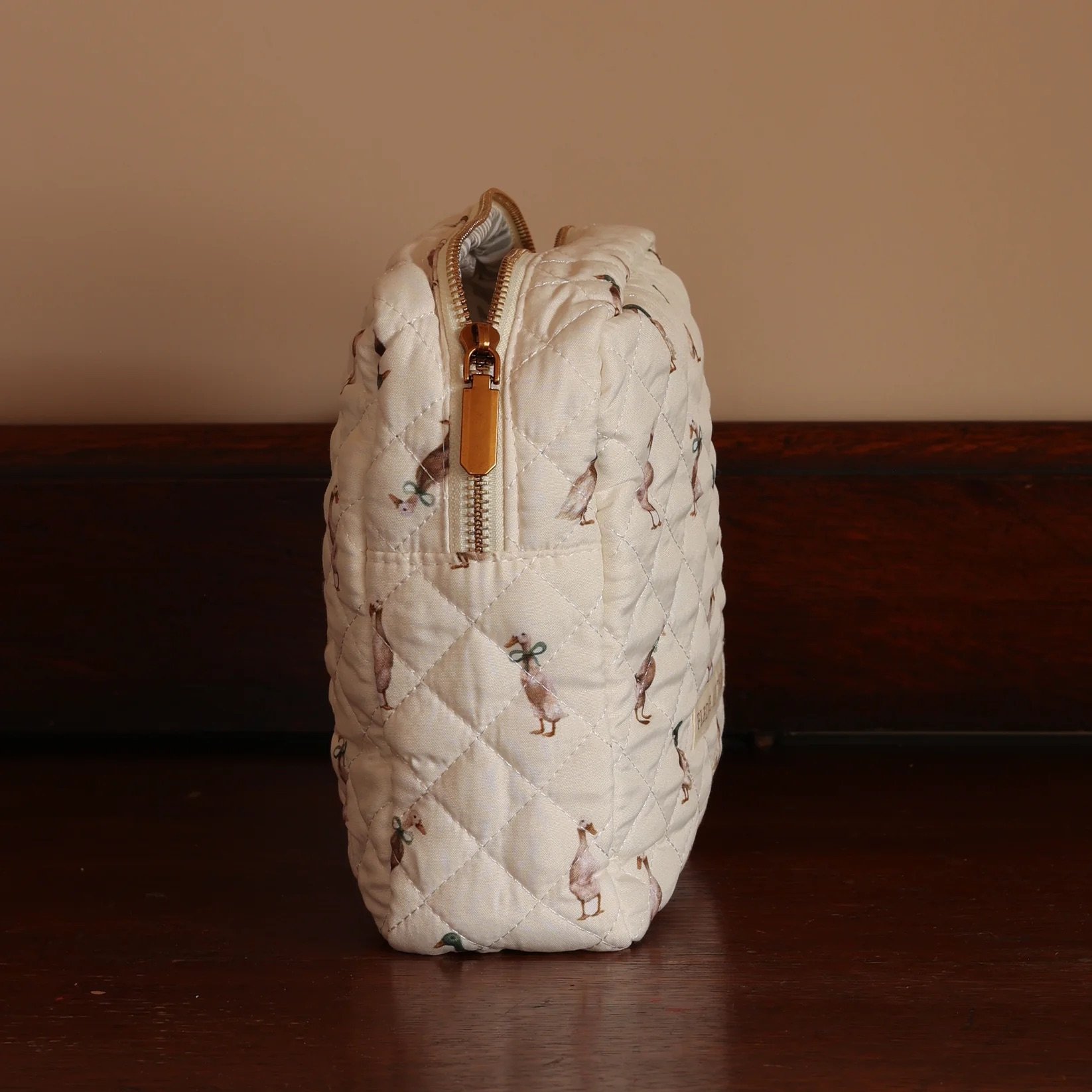 fledge-and-thread-quilted-duck-change-bag.jpeg