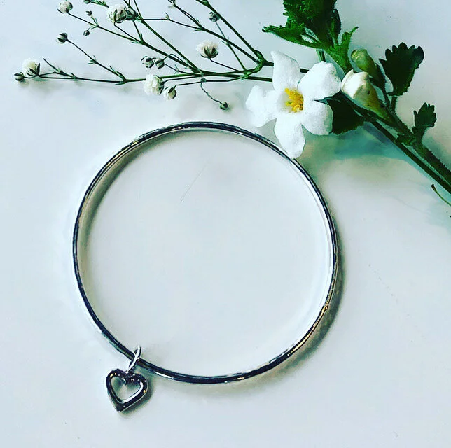 Handmade hammered silver bangle with threaded heart — Vivienne Cate
