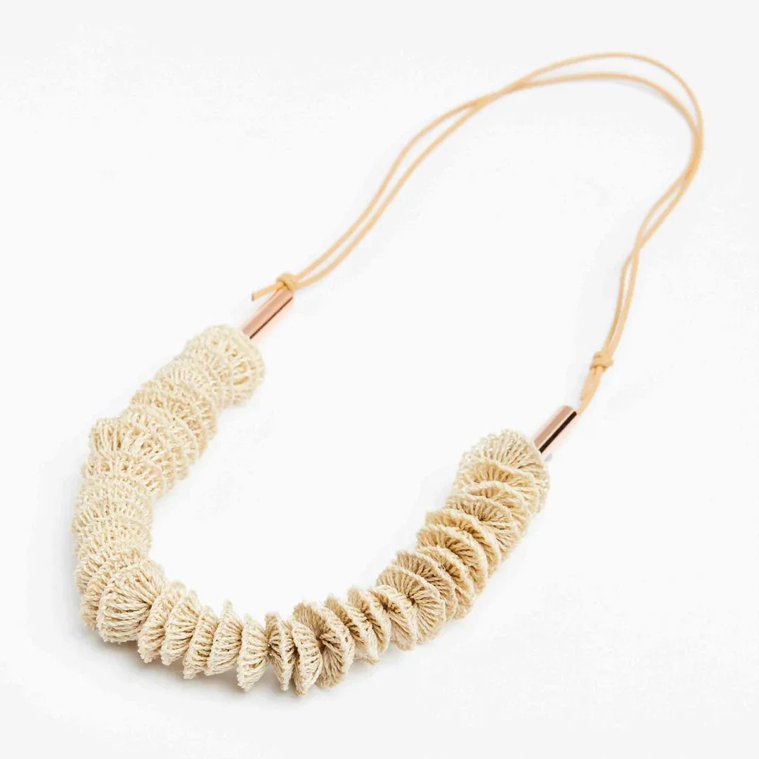 Leather-and-handwoven-natural-fibre-disc-necklace-Bilum-and-Bilas.webp