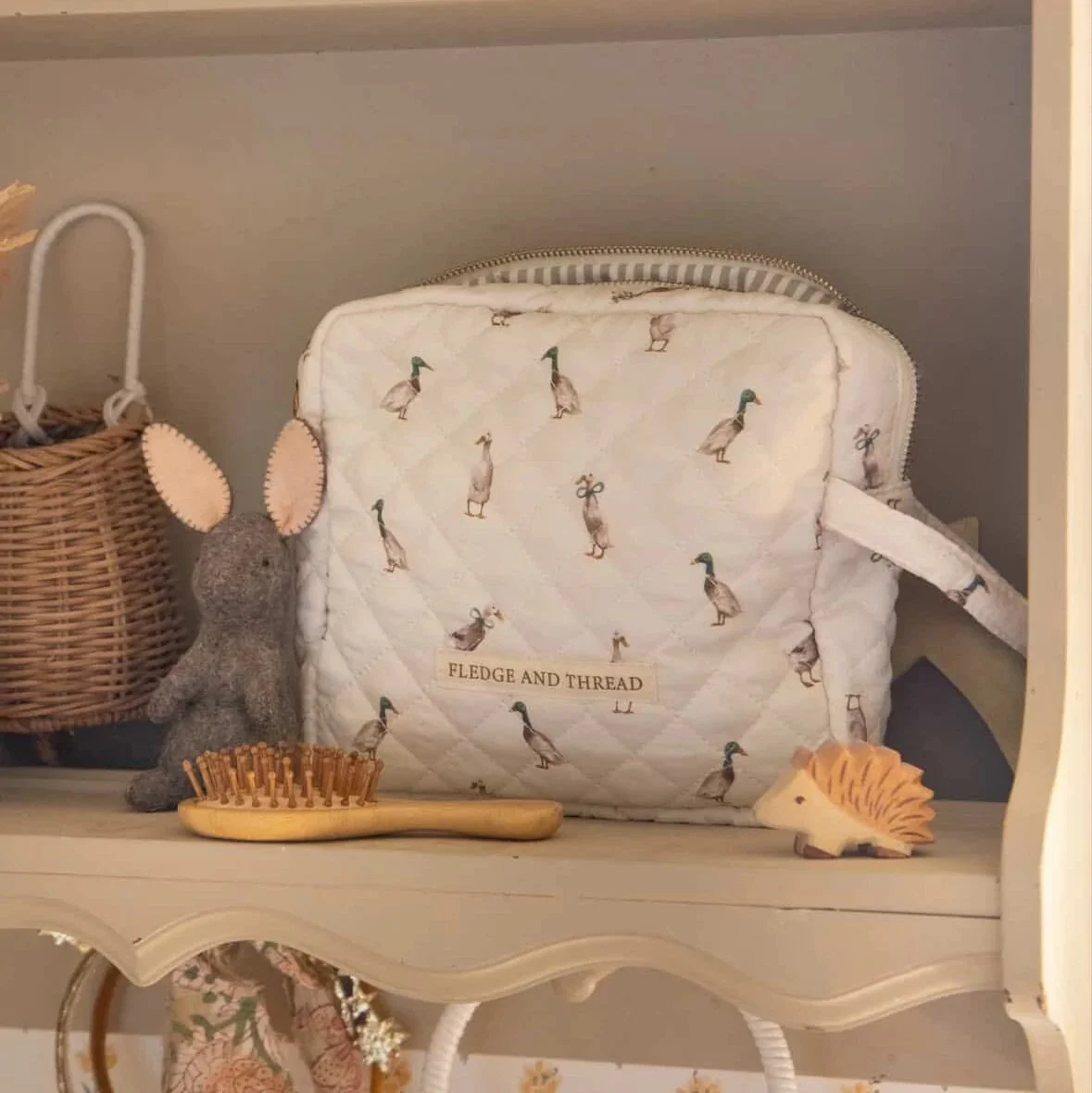 fledge-and-thread-quilted-change-bag-duck.jpeg