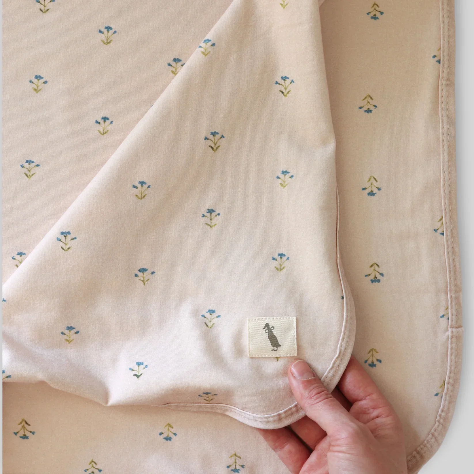 fledge-and-thread-blue-floral-stretch-wrap.webp