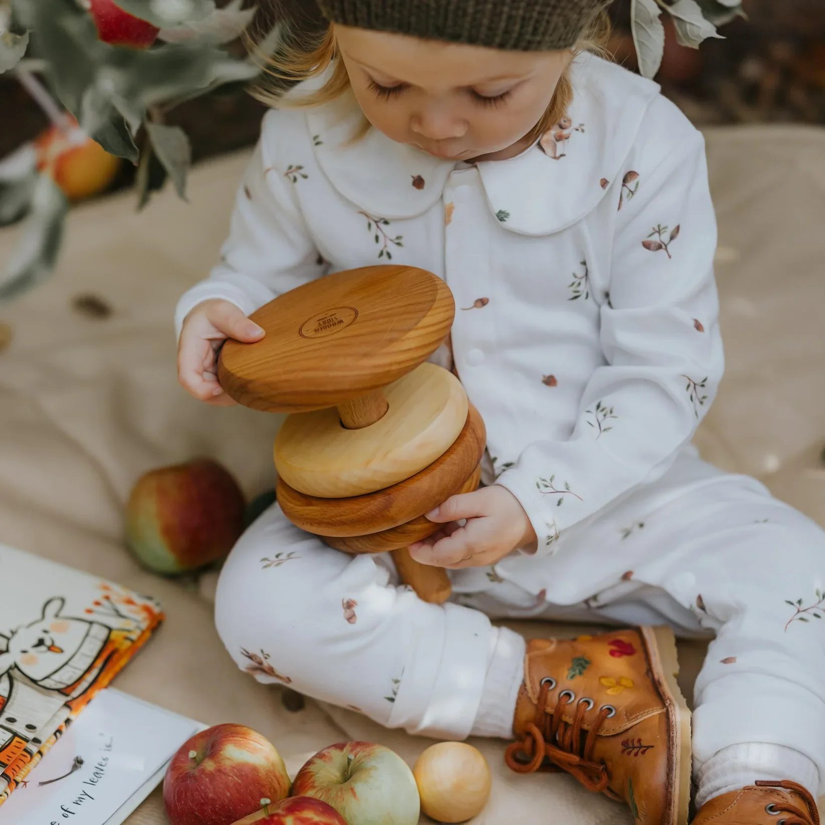 fledge-and-thread-baby-onesie-squirrels-yackandandah.webp