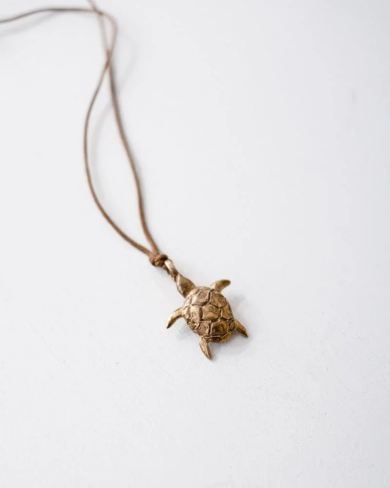 pesci-che-volano-lentezza-turtle-pendant.webp