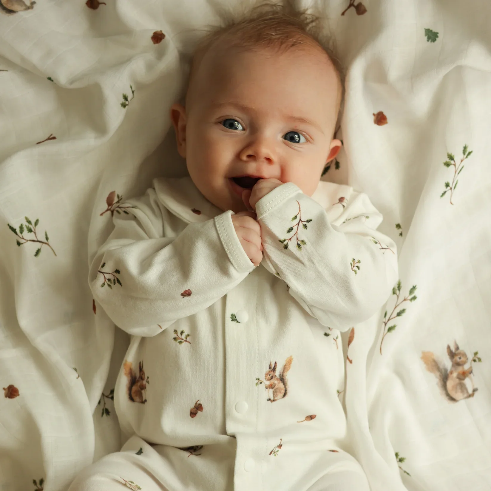 fledge-and-thread-baby-onesie-squirrels-albury.webp
