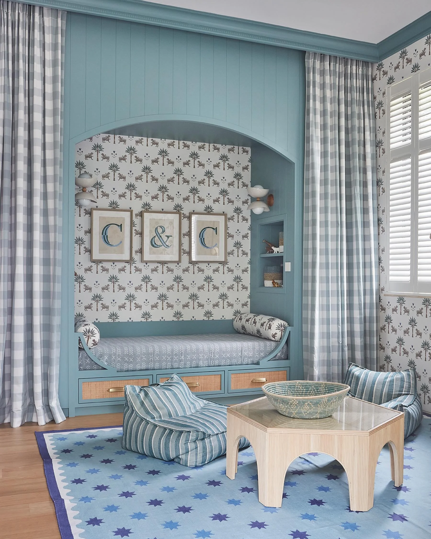 Who doesn&rsquo;t love a cute cabin bed! Here&rsquo;s one we designed in the play room of two lucky little boys in our Meyer Road project. The large scale checked curtains hide shelving behind to store their lego boxes, games and toys! Walls are wrap