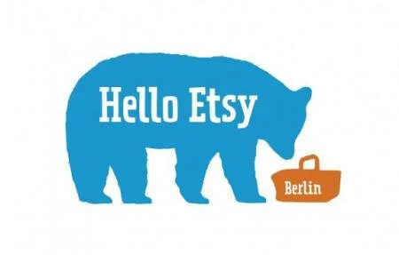 Blue bear silhouette with white text 'Hello Etsy' and a brown shopping bag labeled 'Berlin'.