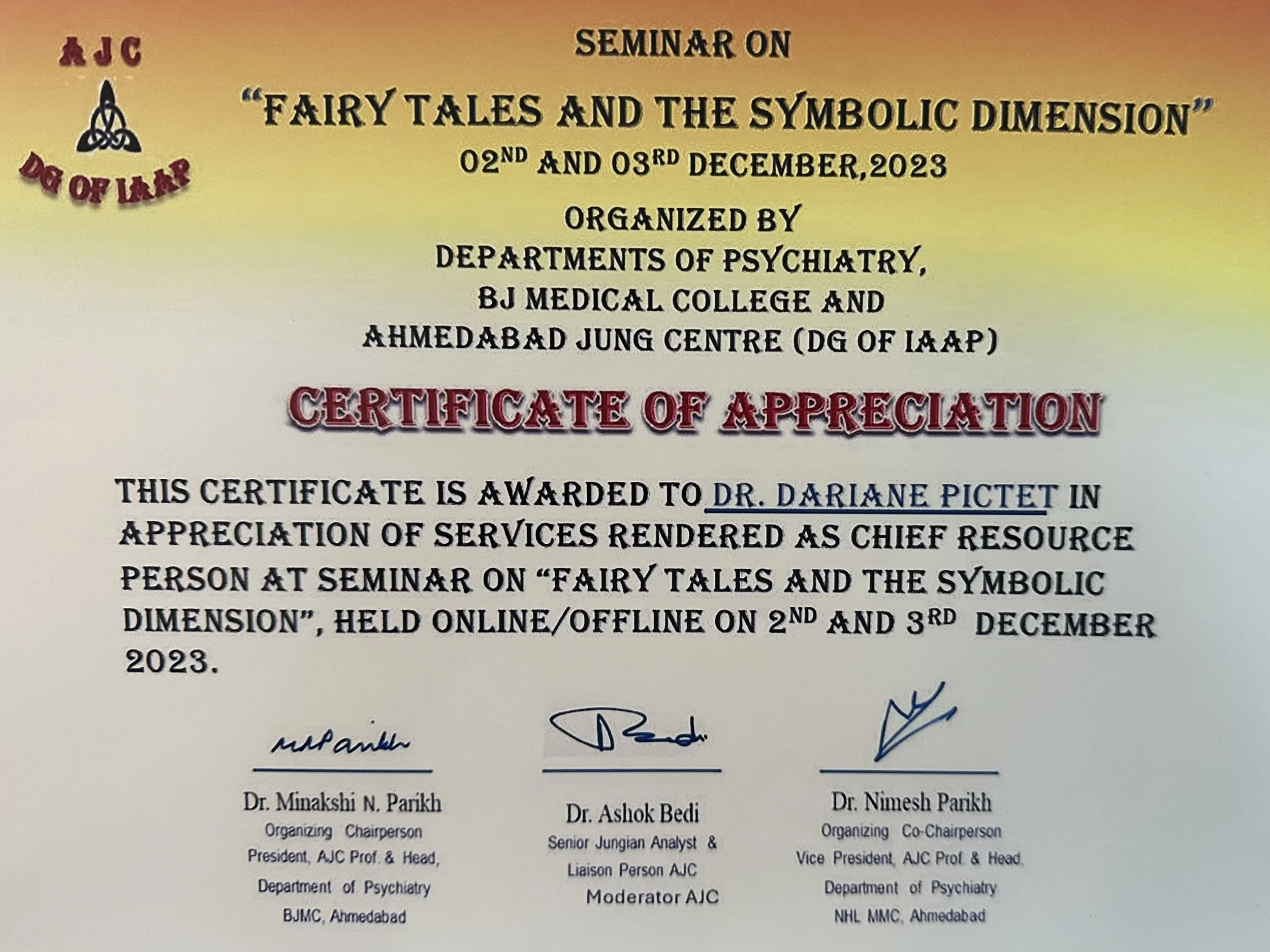 Certificate of appreciation awarded to Dr. Dariane Pictet for services as chief resource person at a seminar on fairy tales and symbolic dimension held online and offline on December 2nd and 3rd, 2023, organized by departments of psychiatry at BJ Medical College and Ahmedabad Jung Centre. Signatures of three officials are at the bottom.
