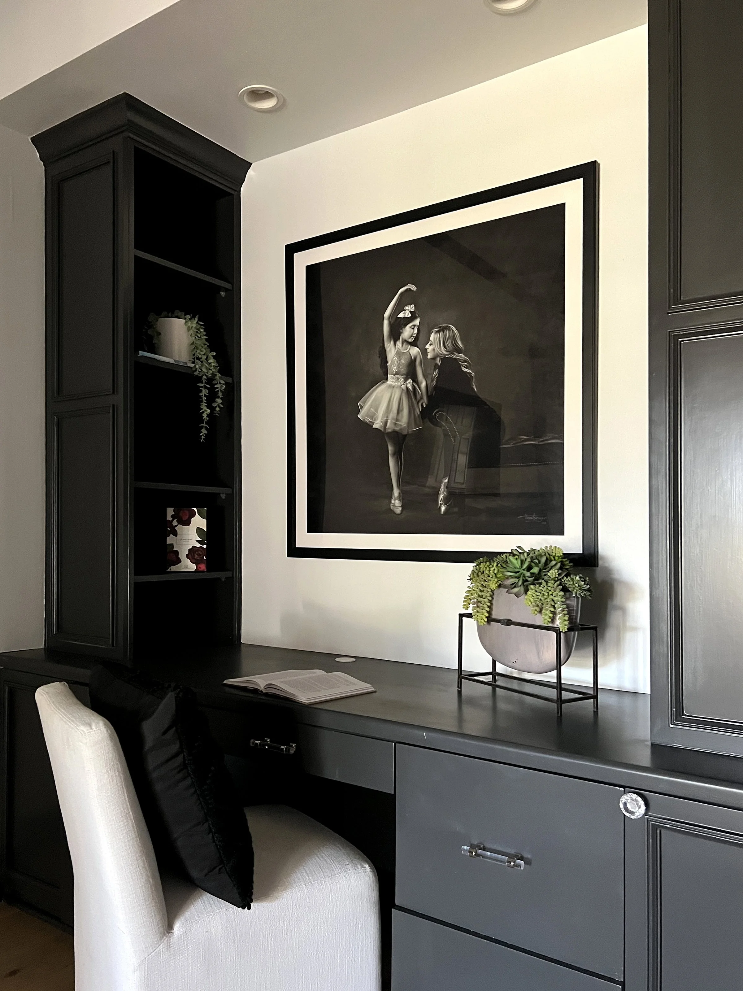 Large format commissioned family portrait artwork hanging in a Avila homein Tampa, FL