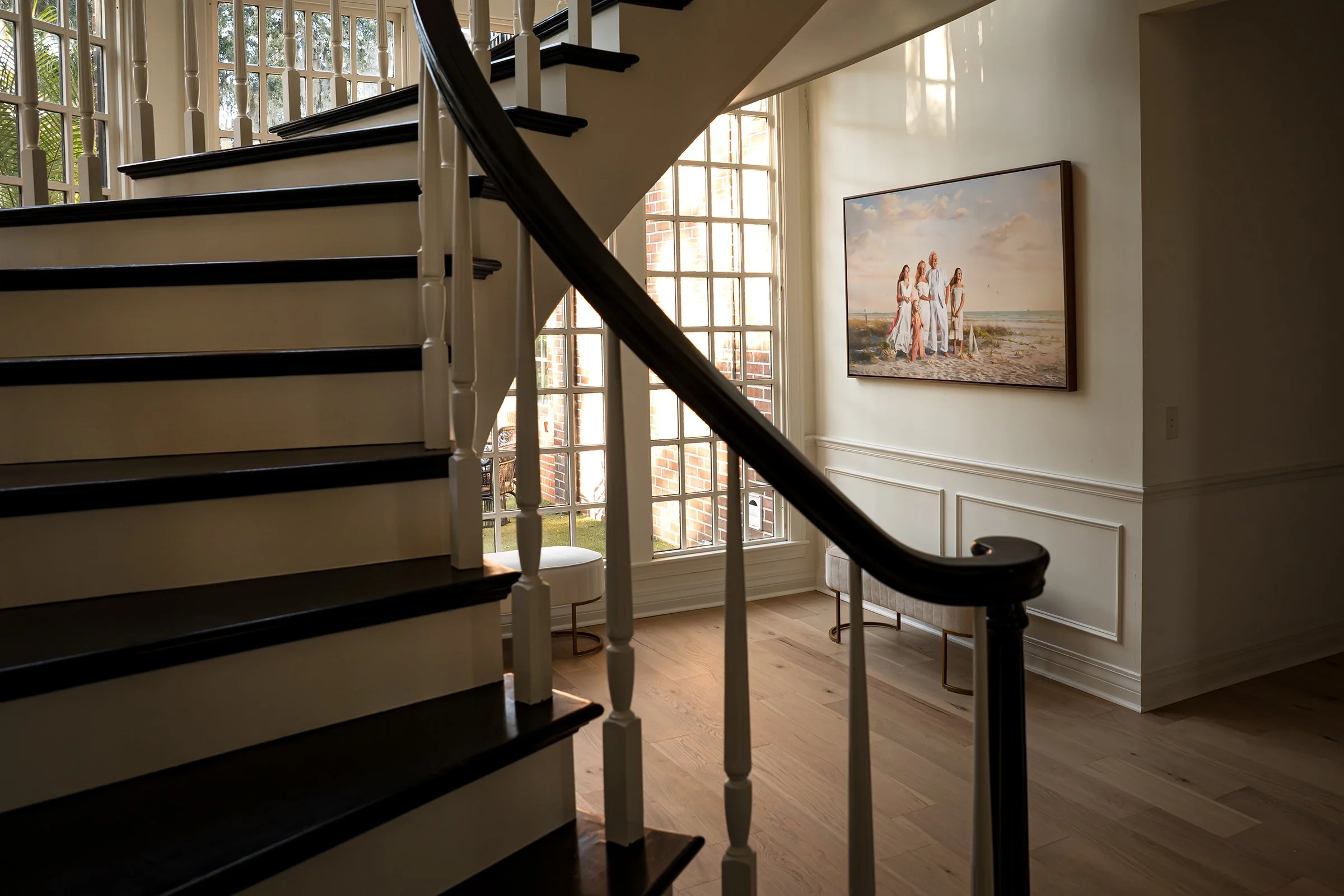 Commissioned family portrait artwork displayed as wall art in a home