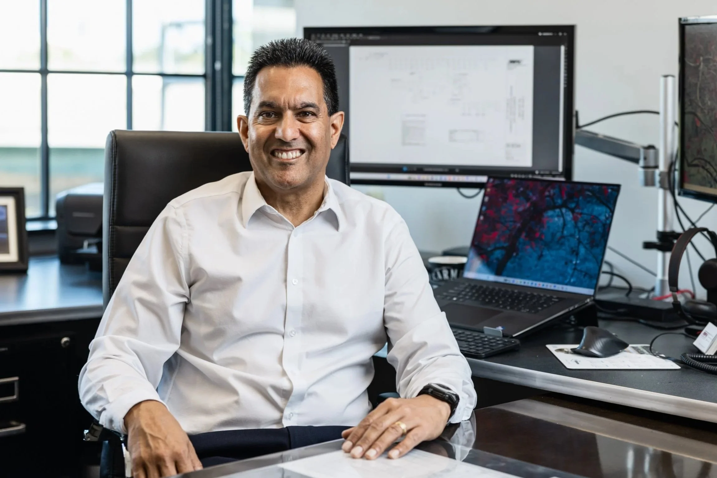 Sanjay Sahni working at his desk