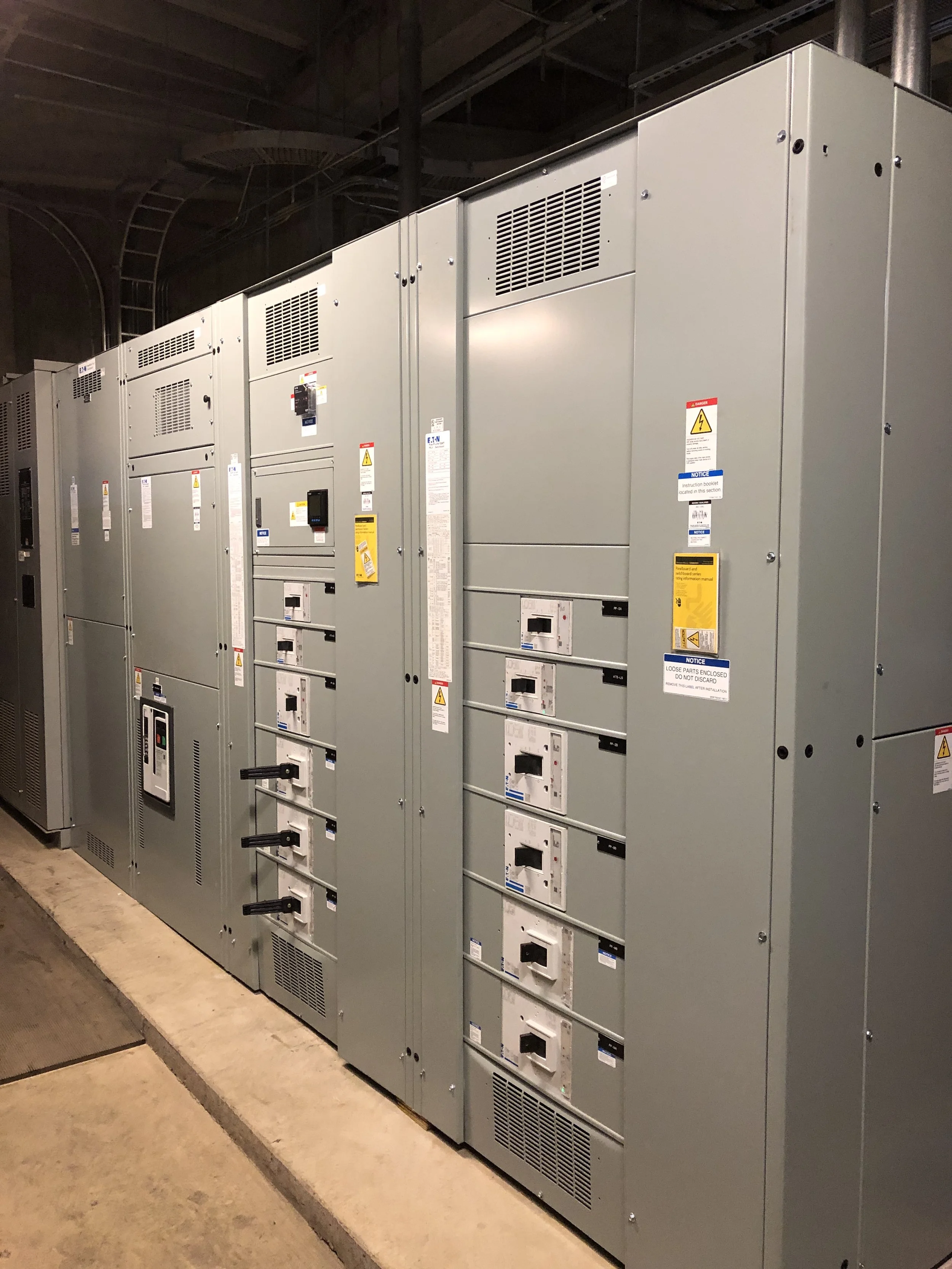 Electrical switchgear panels in a power facility.