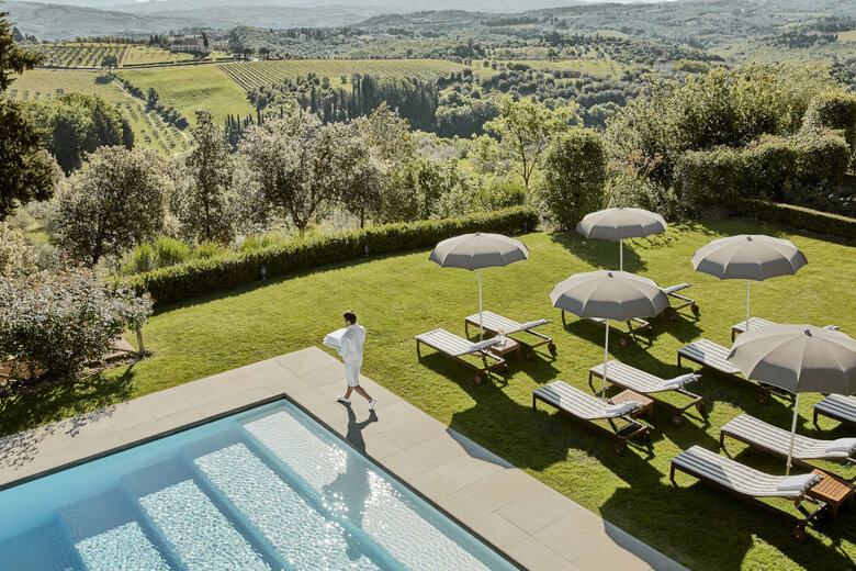 COMO-Castello-Del-Nero_Garden-Pool-Terrace_with-Pool-Attendant.jpeg