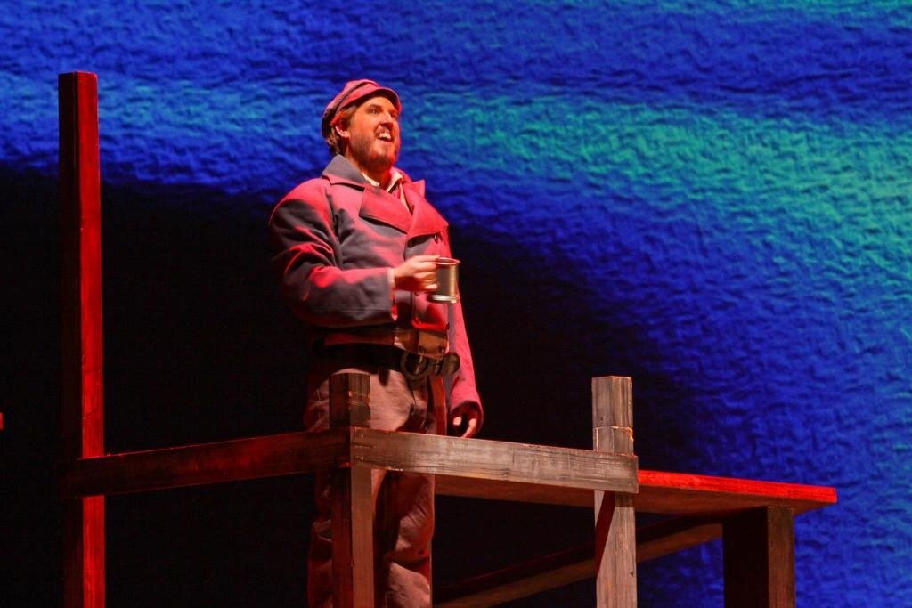  Daniel Stein as Der Steuermann in Opera Carolina's production of Wagner's Der Fliegende Holländer (Photo by Jon Silla) 