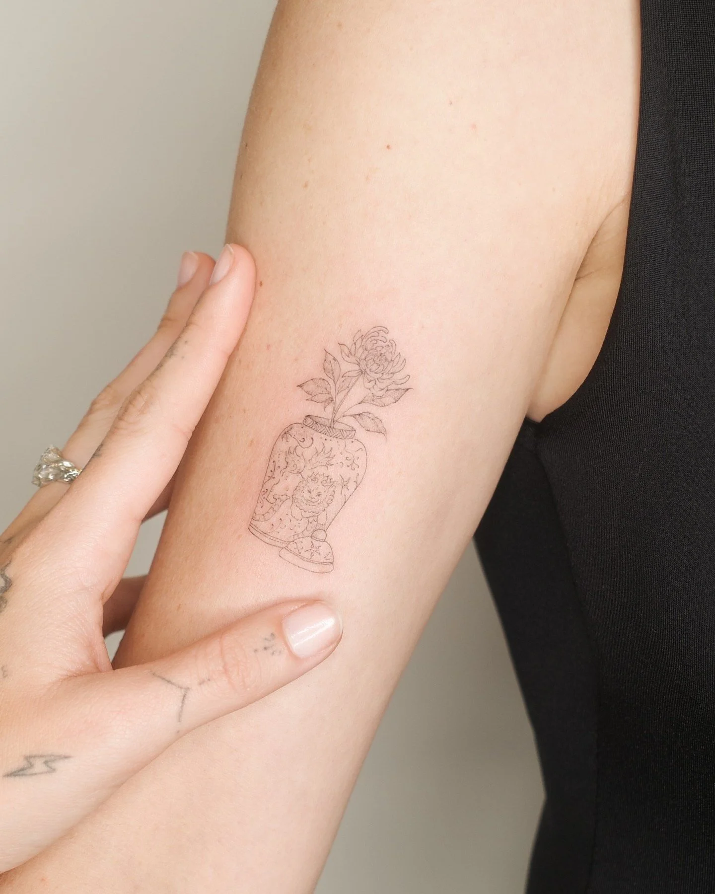 A collection of works by @m3.ink.

Marina is a fine line tattoo artist whose work is rooted in a love of fine arts and calligraphy. Known for her delicate illustrations and expressive handwritten forms, she creates tattoos that feel feminine, fluid, 