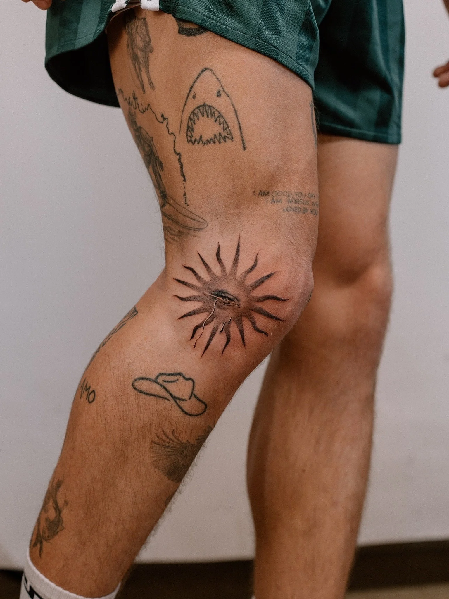 Meg&rsquo;s (@tattoobymeg) fine line and illustrative work is rooted in a love of flora, fauna, and art-inspired typography. Drawing from a background in oil painting, she creates movement-focused tattoos that blend realism with subtle surrealist ele