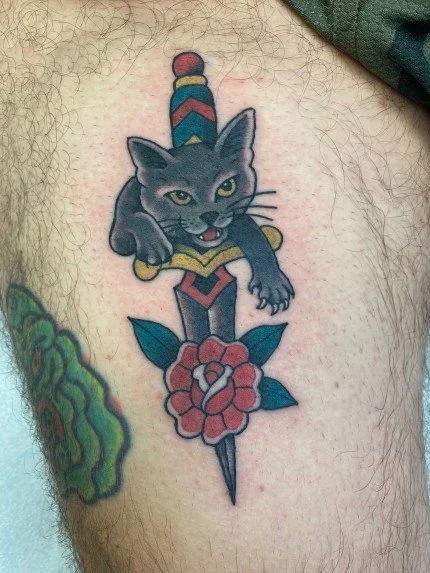 This tattoo is the cat&rsquo;s meow! Rich has time this month to tattoo you so call or text 732-503-8469 to book with him

#traditionaltattoo #cattattoo #daggertattoo #rosetattoo #colortattoo #njtattoo #njtattooartist #njtattooshop #bricknj #oceancou