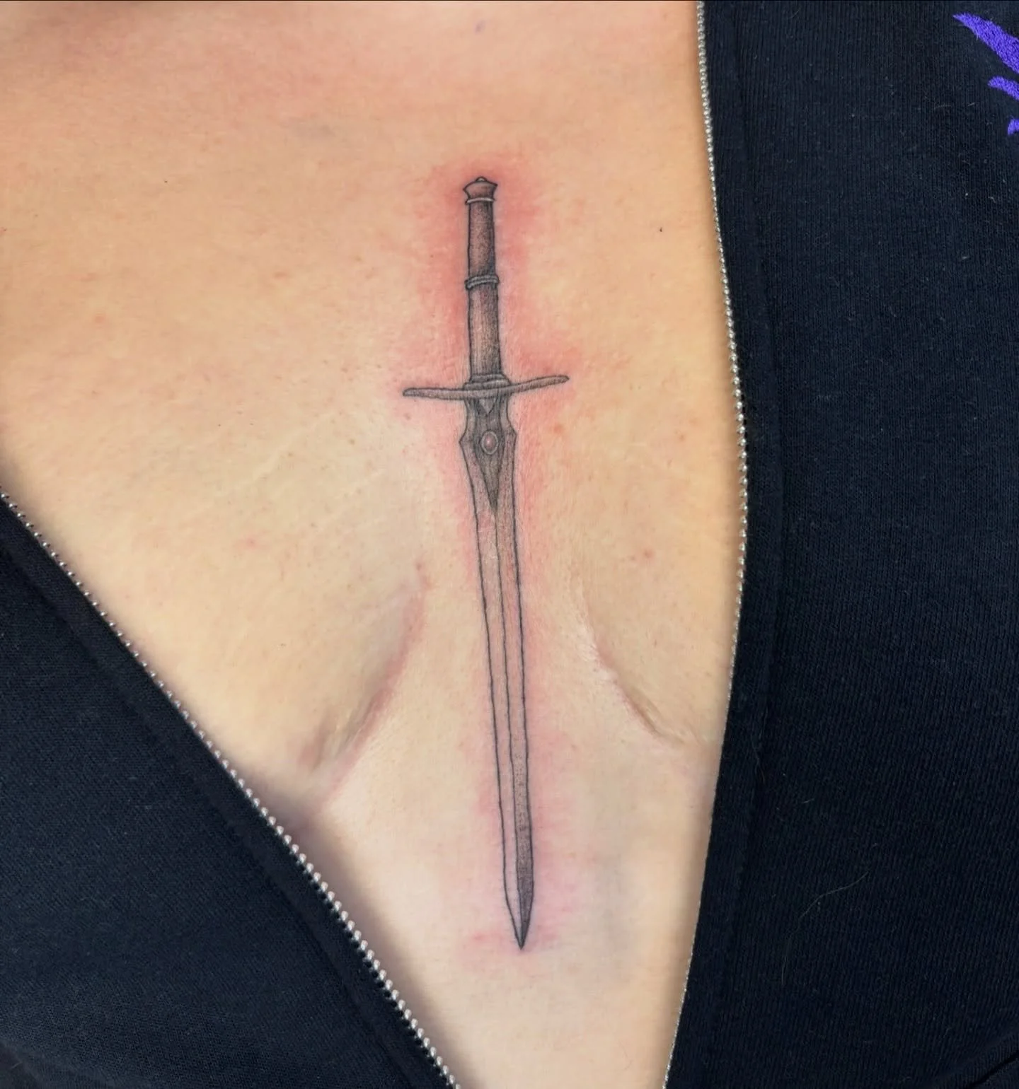 Sternum sword done by Casey 🗡️ Want a tattoo of some weaponry? Fill out the form in our bio to book one with her!

#swordtattoo #sternumtattoo #finelinetattoo #njtattooshop #bricknj