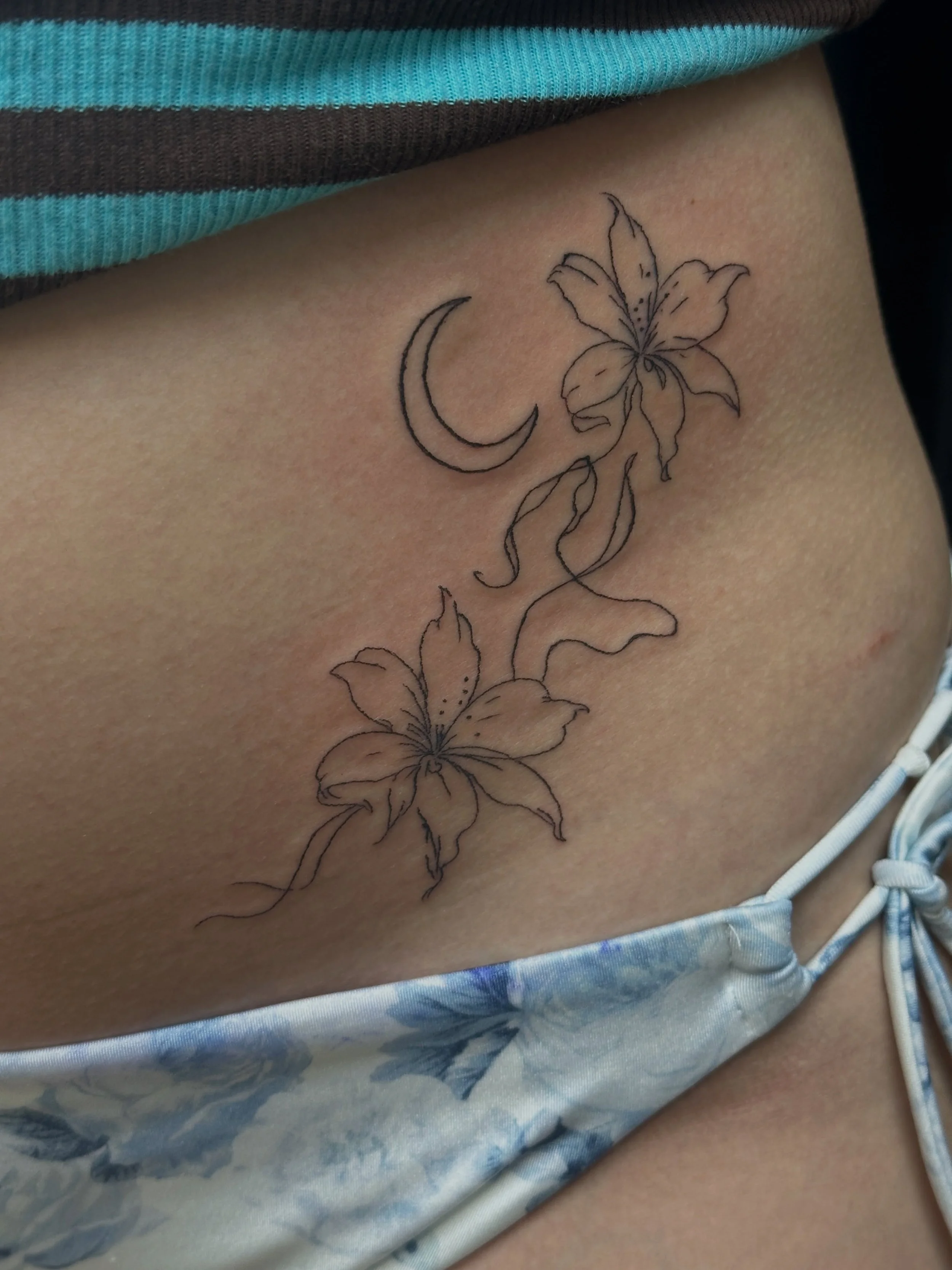 Matching tattoos for these BFFs ❤️ #matchingtattoos #femaletattooartist #radiantenergytattoo #hiptattoo #sunandmoontattoo